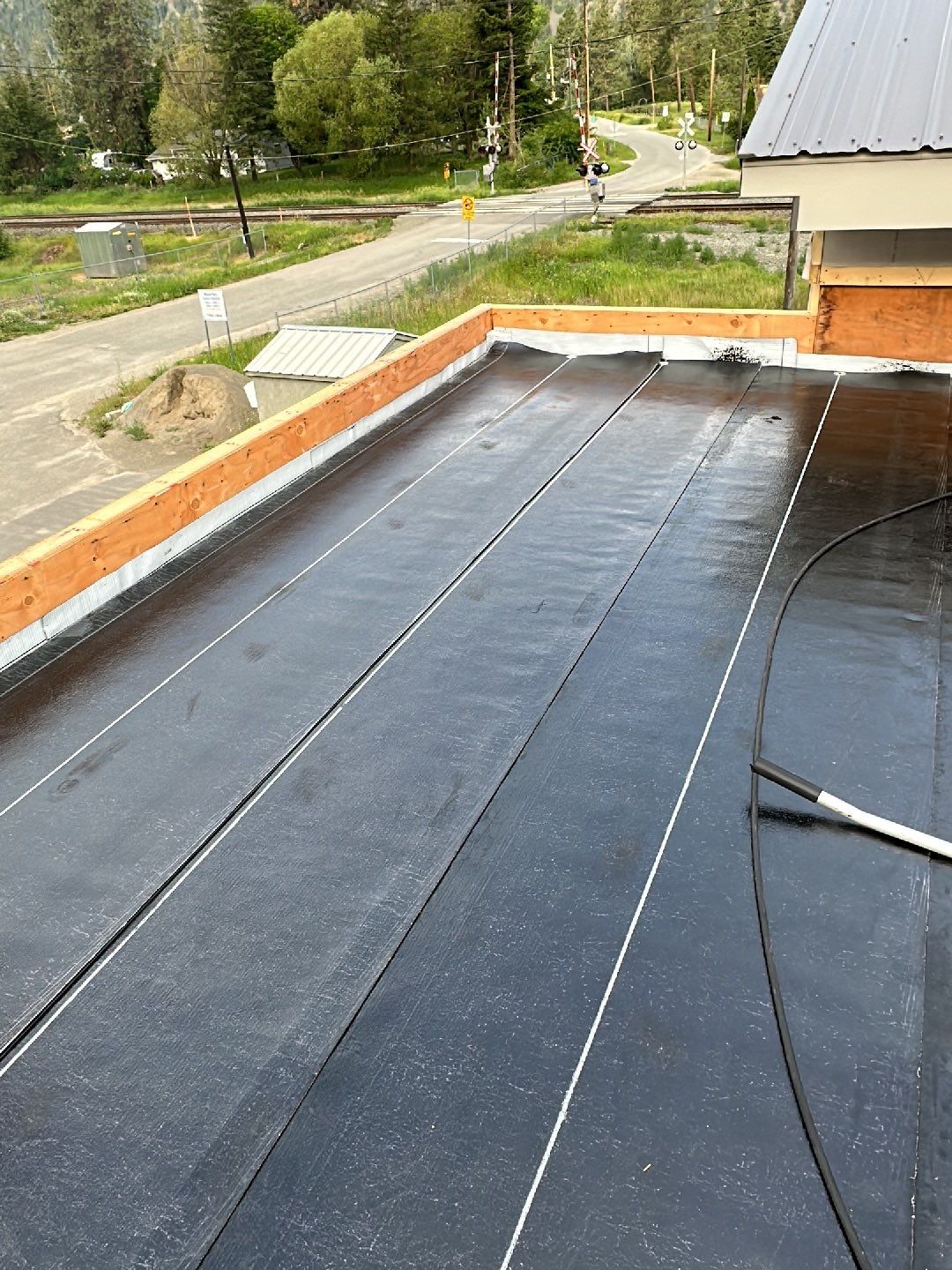 Commercial Roofing Installation using IKO 2ply sbs  by Top Notch Roofing Inc