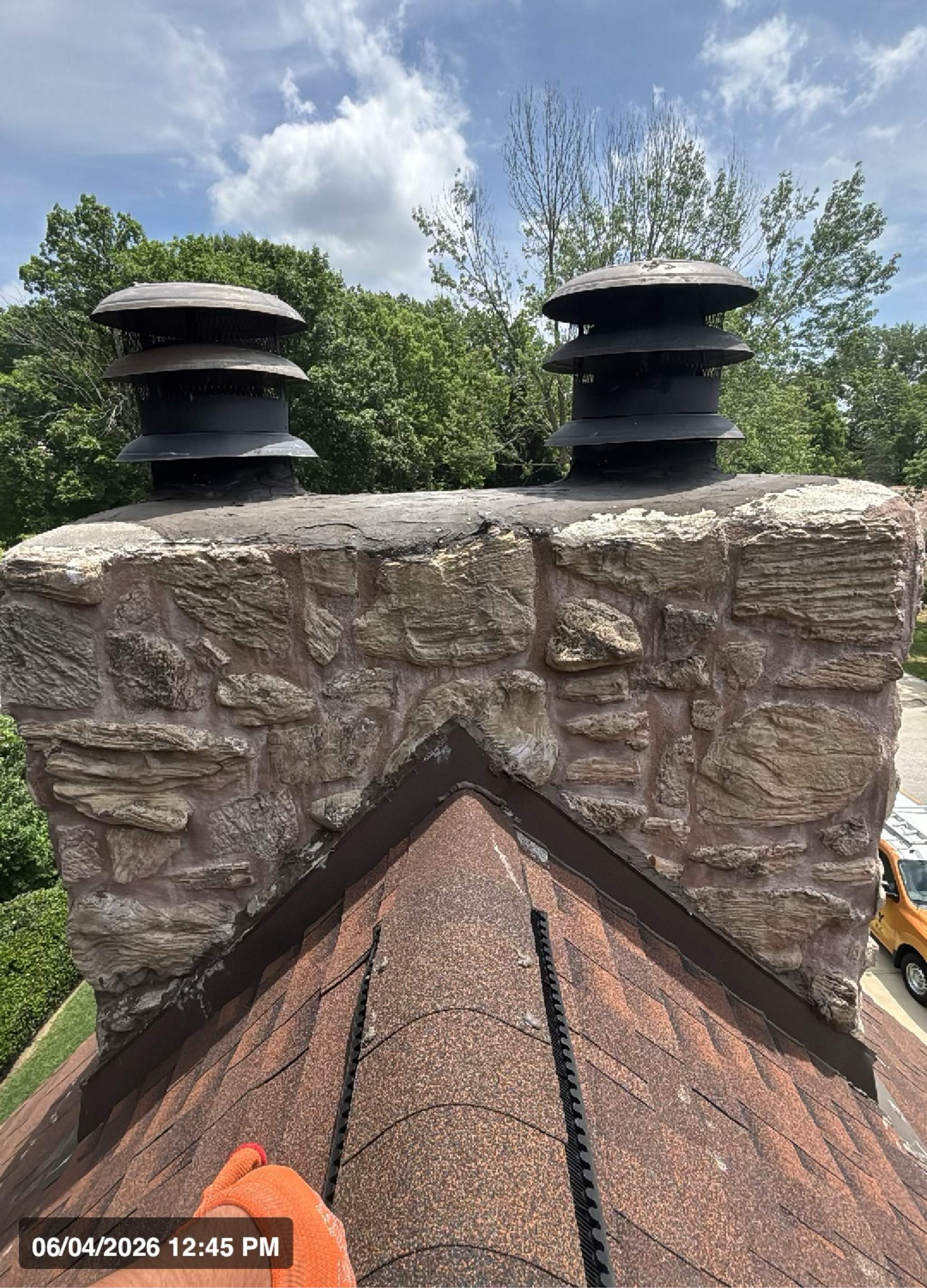 Structural Stone Chimney Restoration and Roof Repair in Leavenworth by Summit Roofing