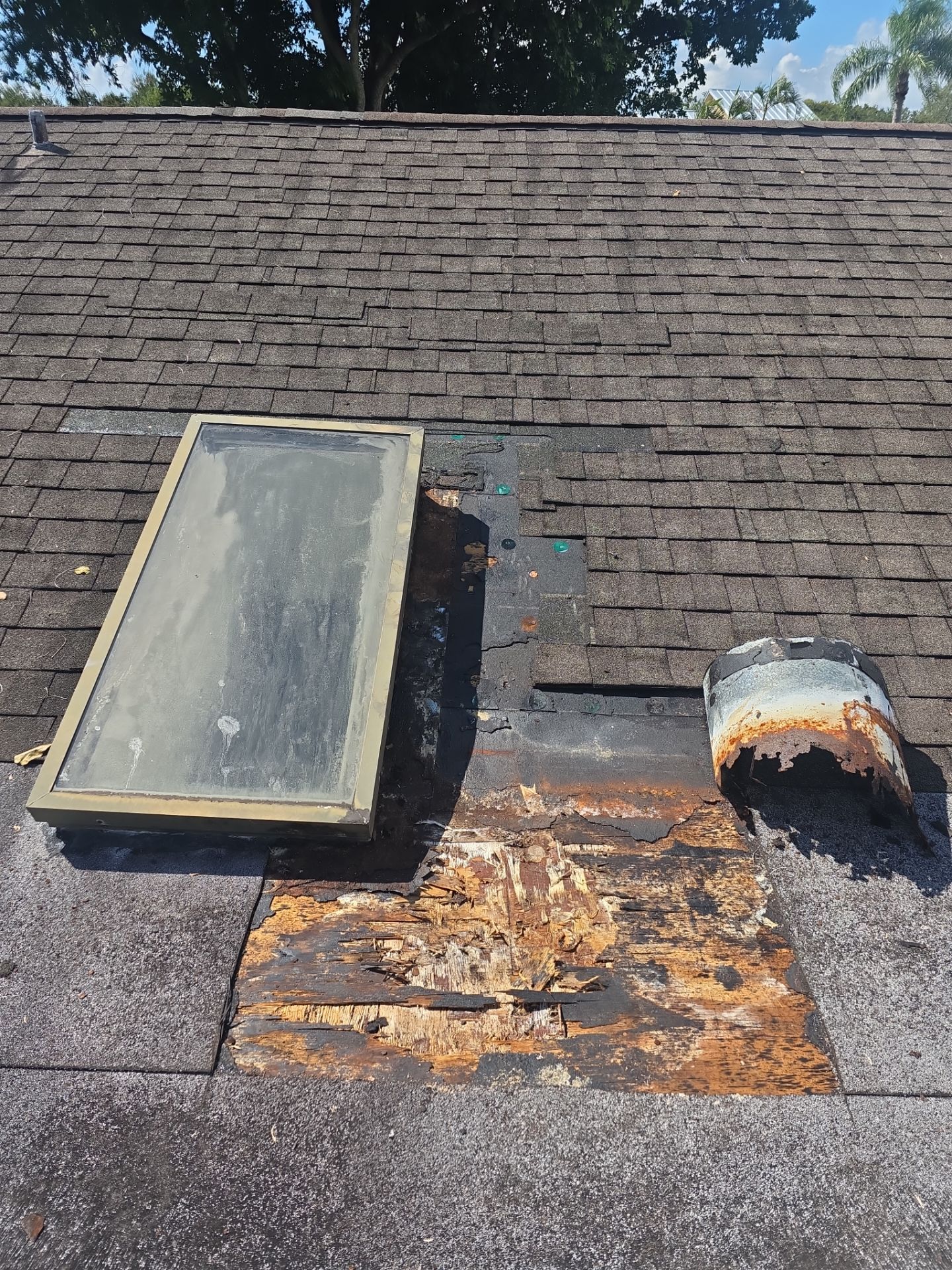 REPLACE NON APPROVED SKYLIGHT ALONG WITH CLOGED GUTTER by Morton Roofing, Inc.
