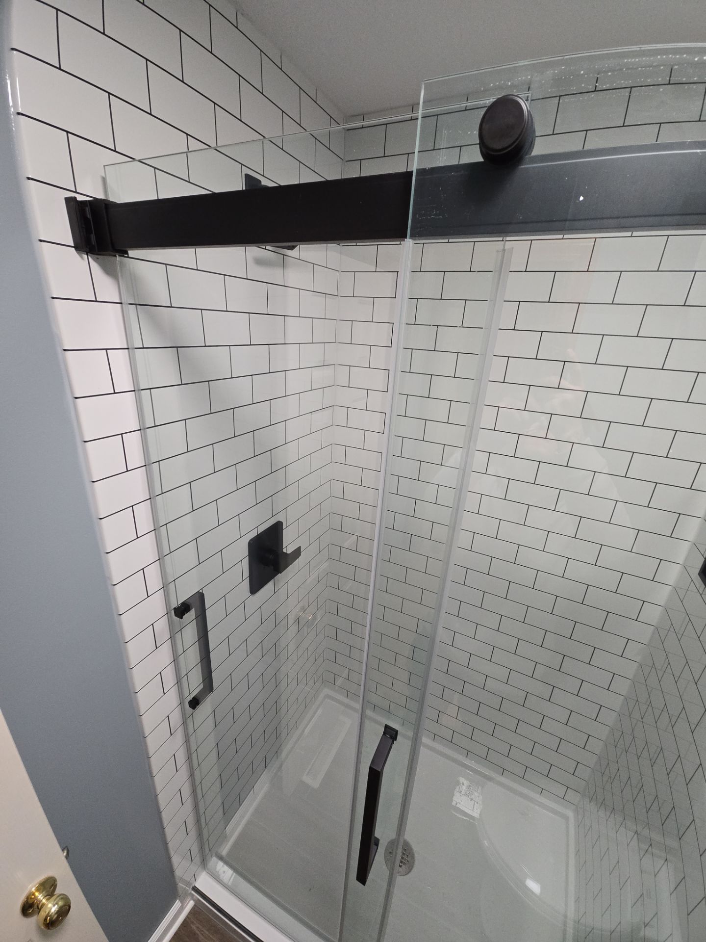 Shower Replacement and Tile Floor by The Shower Company