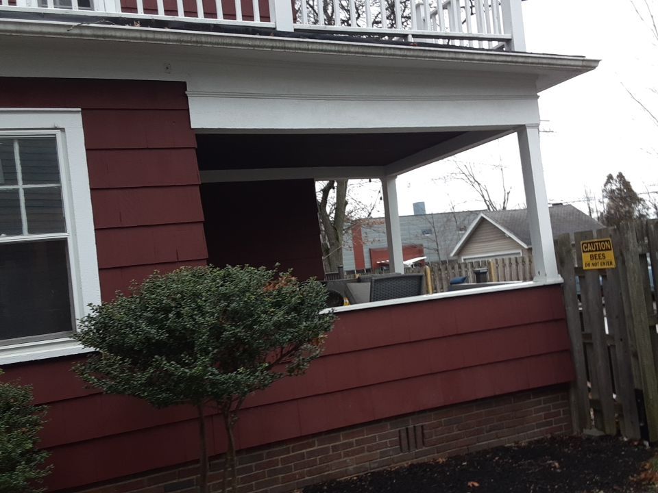 Residential Roof Replacement using Patio Roof by Absolute Roofing and Construction