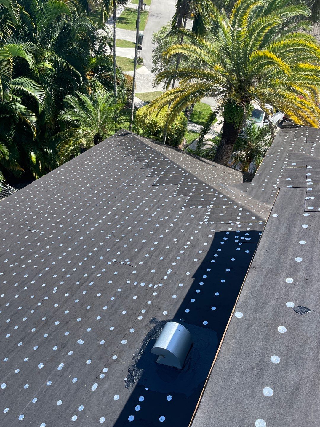 Residential Roofing Installation using 1" Nail strip metal roof by BLUES BROTHERS ROOFING