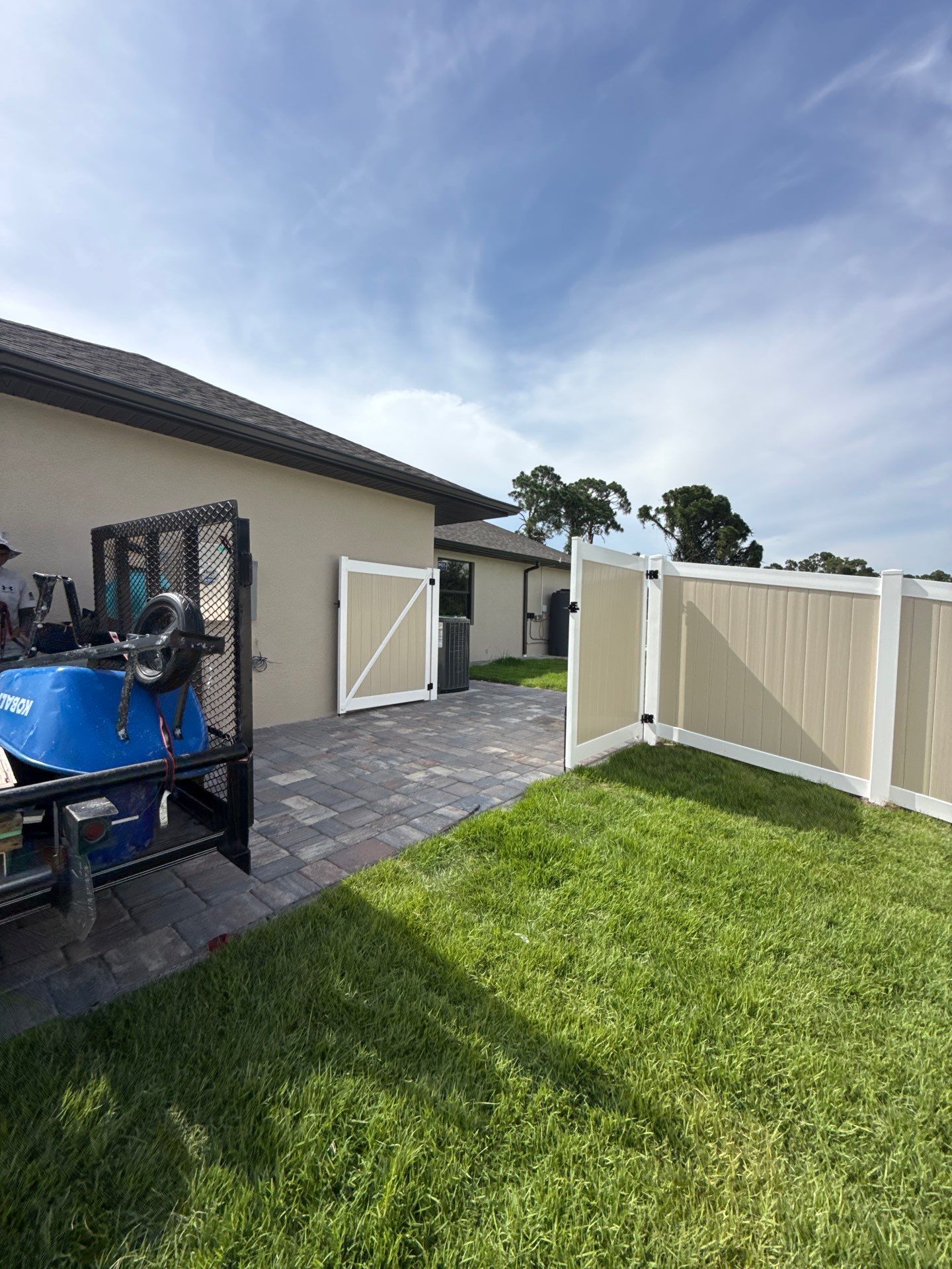 Custom Two-Tone Vinyl Privacy Fence Installation in North Port by True Fence LLC