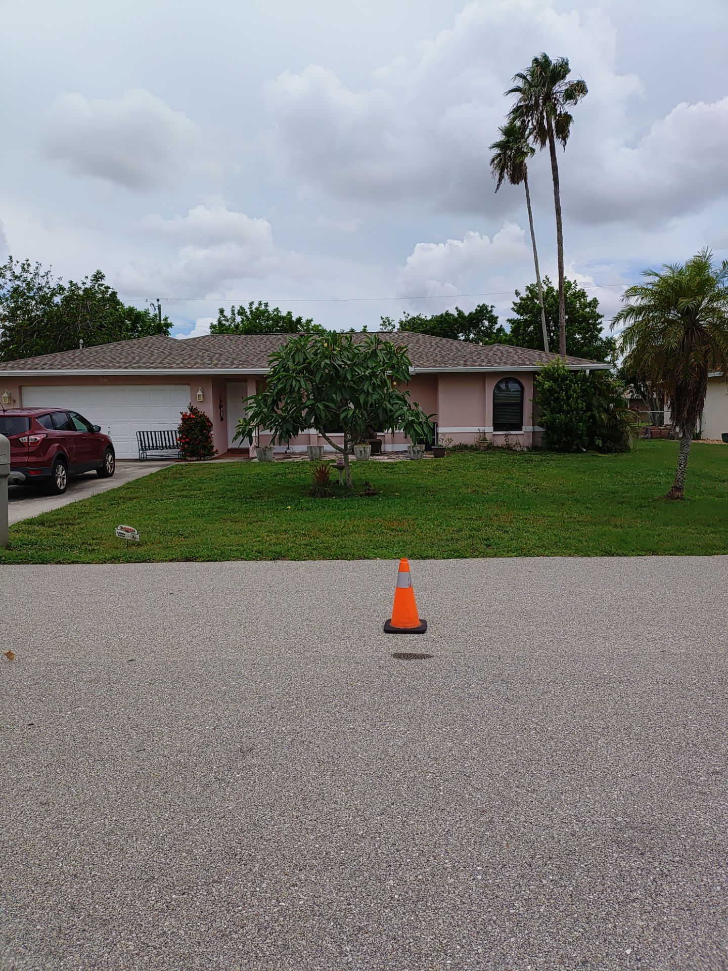 Replace gutter using White Down Spouts in Cape Coral FL by Gutter Professors