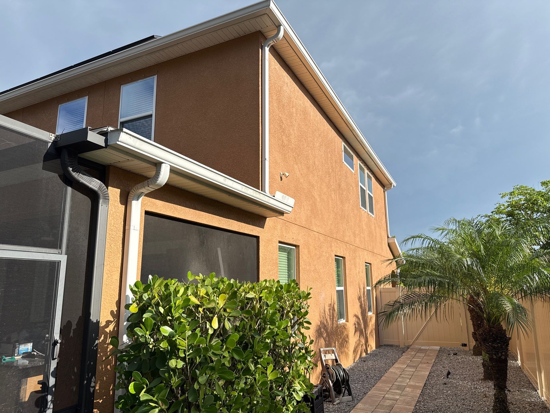 Full Exterior Cleaning – Two-Story House, Gutters, and Fence in Old Mill Preserve, Palmetto, FL by Sunshine AquaWash