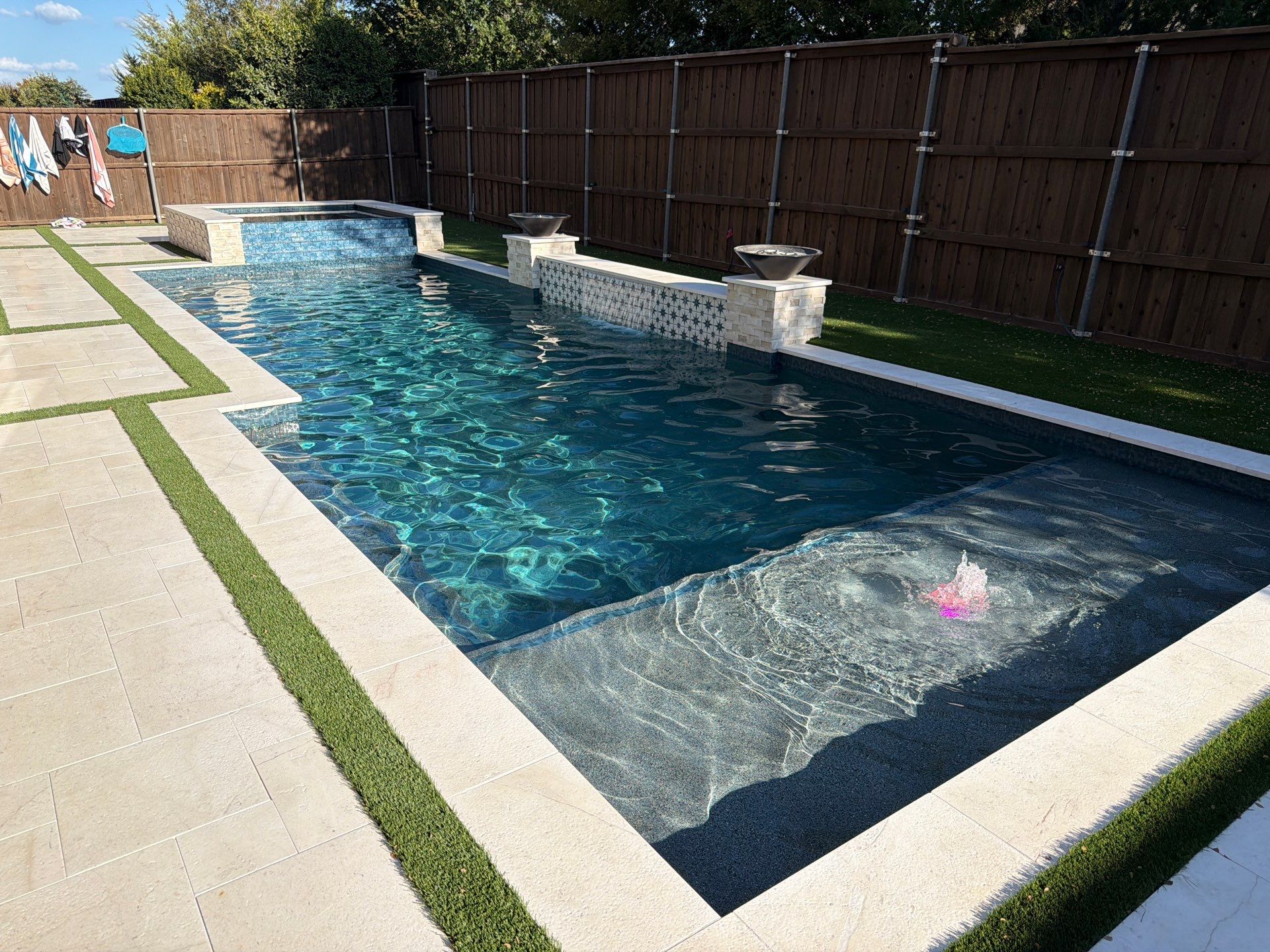 Modern Geometric Pool with Tile Waterfall Wall and Fire Bowls by Pinnacle Pools and Spas - DFW
