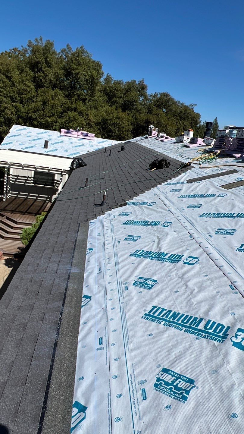 Gutters and new Roof by Byers Enterprises 