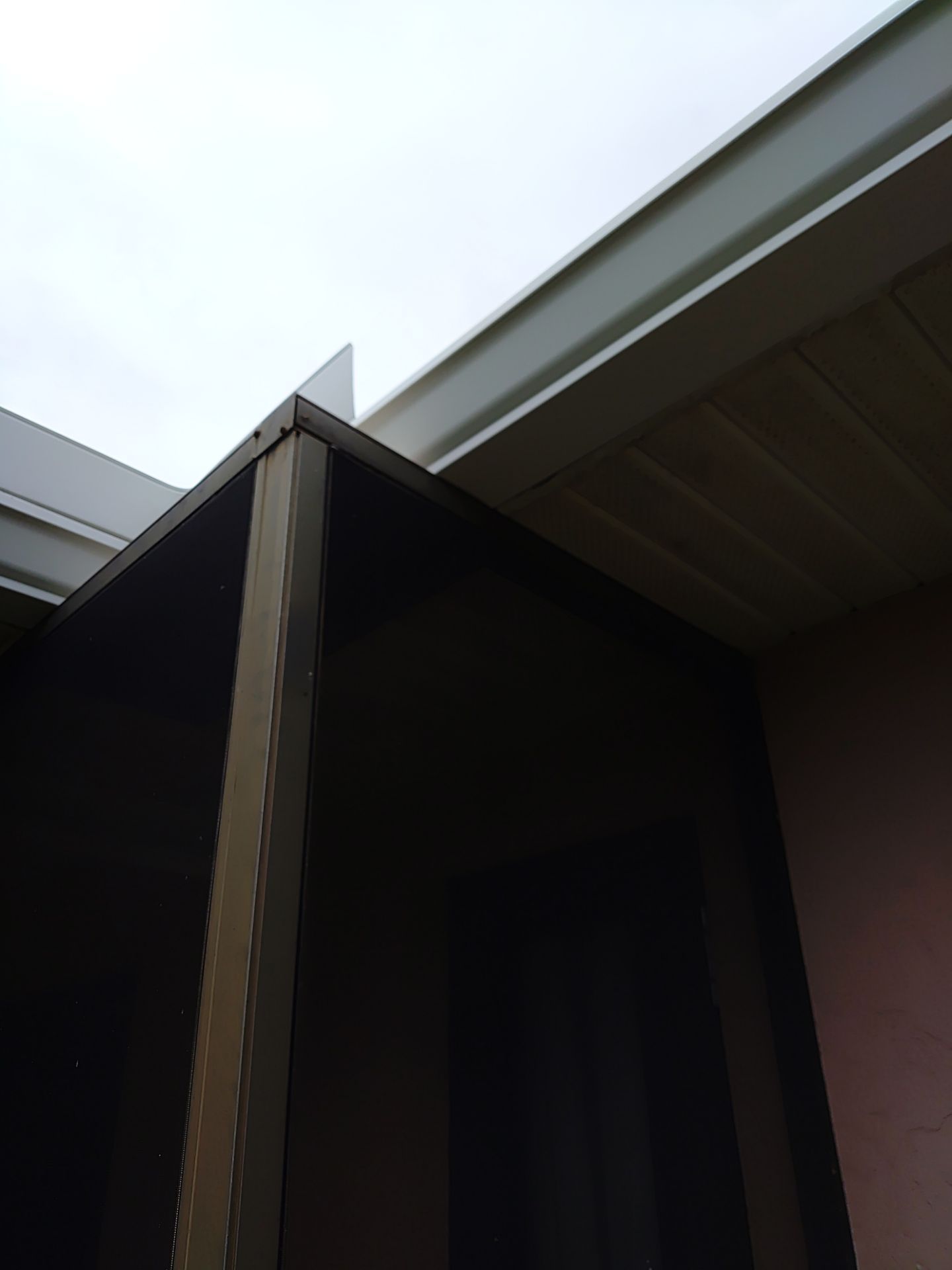 Replace gutter using White Down Spouts in Cape Coral FL by Gutter Professors