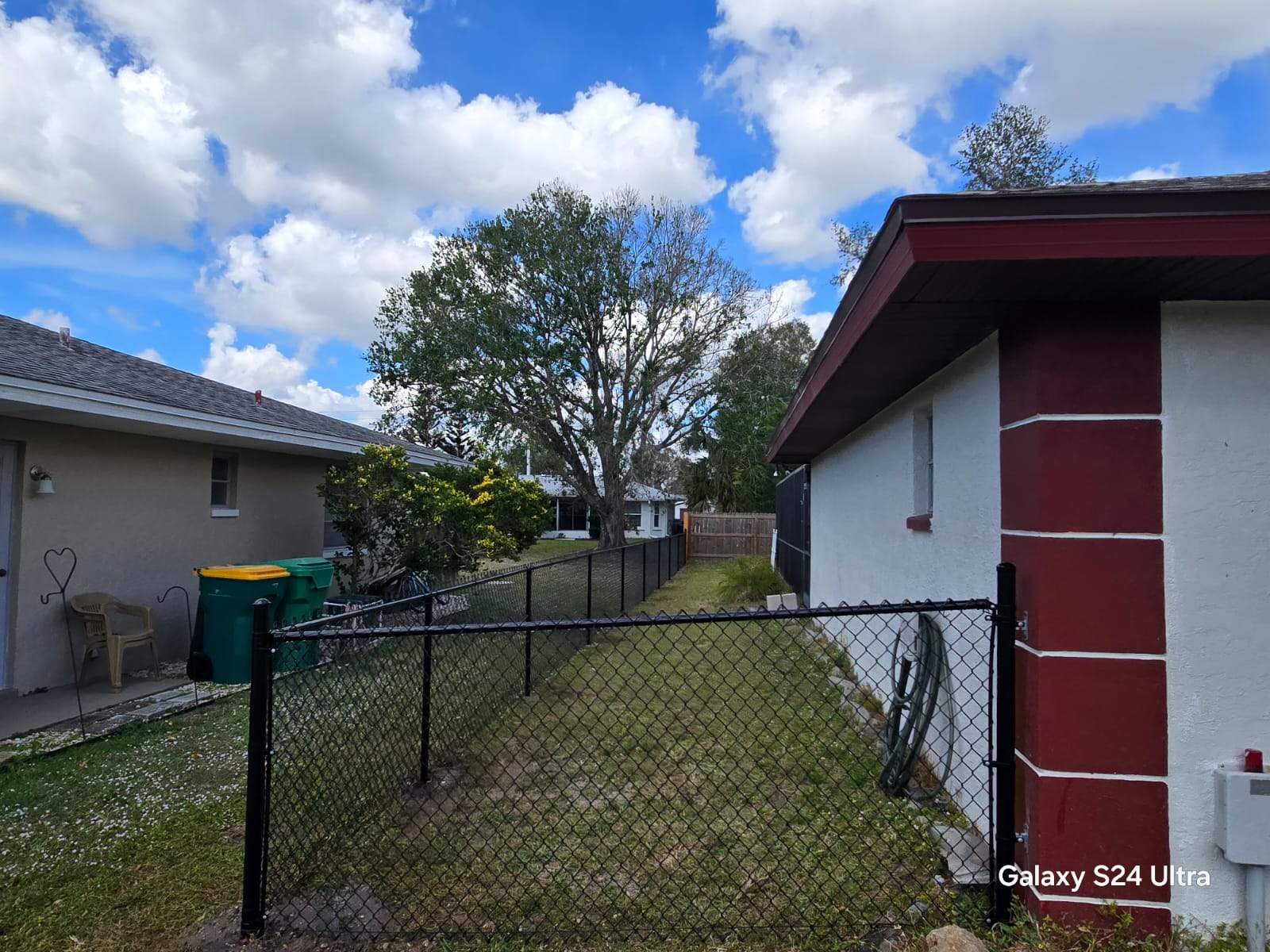 Black Chain Link Fence Installation for Port Charlotte Residence by True Fence LLC
