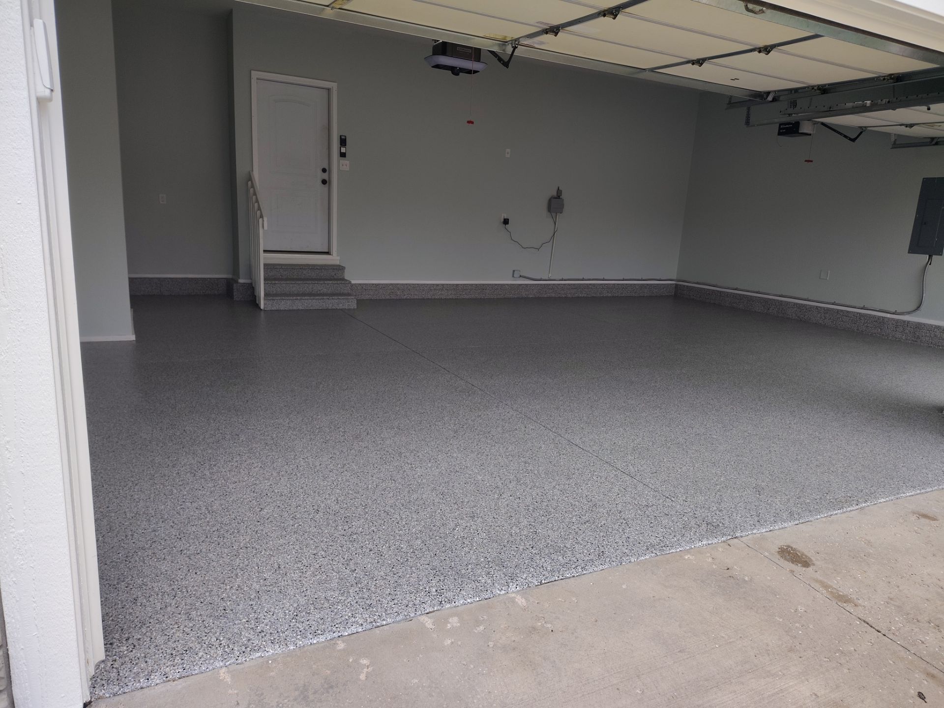 New Garage Floor Transformation in Ankeny by Revival Concrete Coatings