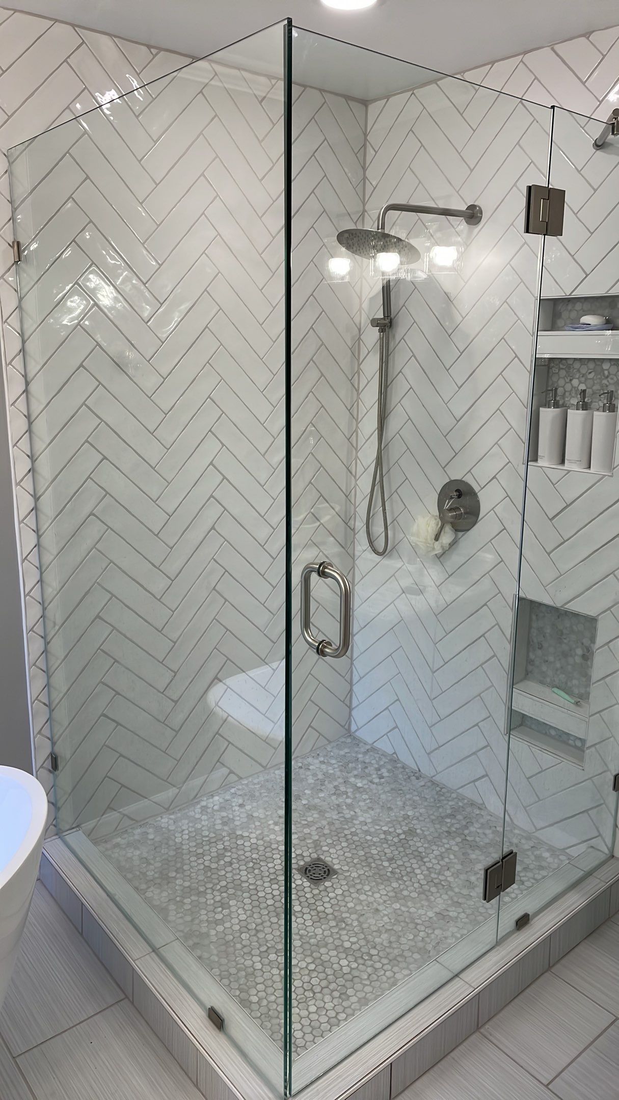 Bathroom Remodel using Schluter by Footprints Floors of Coastal Carolina
