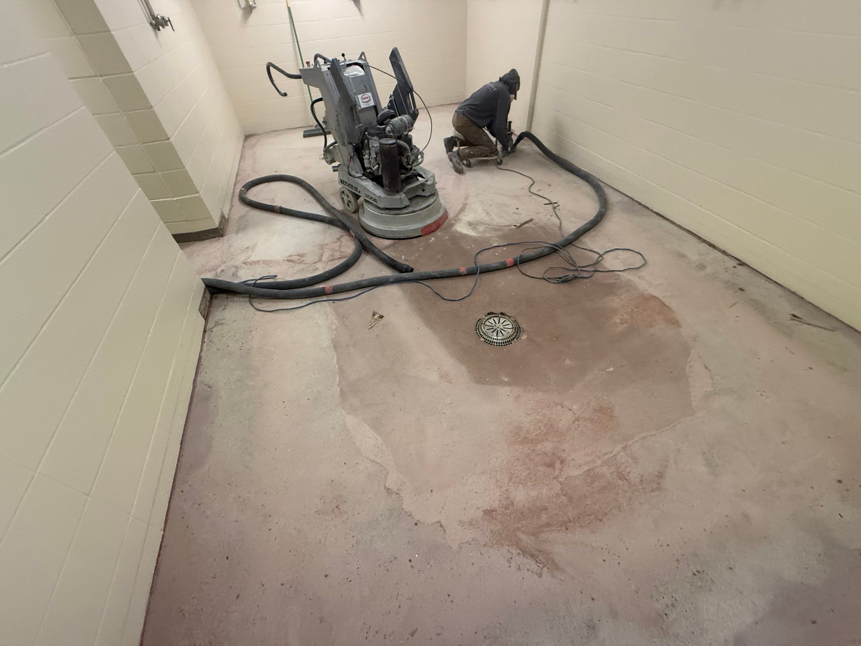 Seamless Epoxy Floor Coating at the Sioux Falls Canaries Facility by Select Painting, Coatings & Garage Cabinets