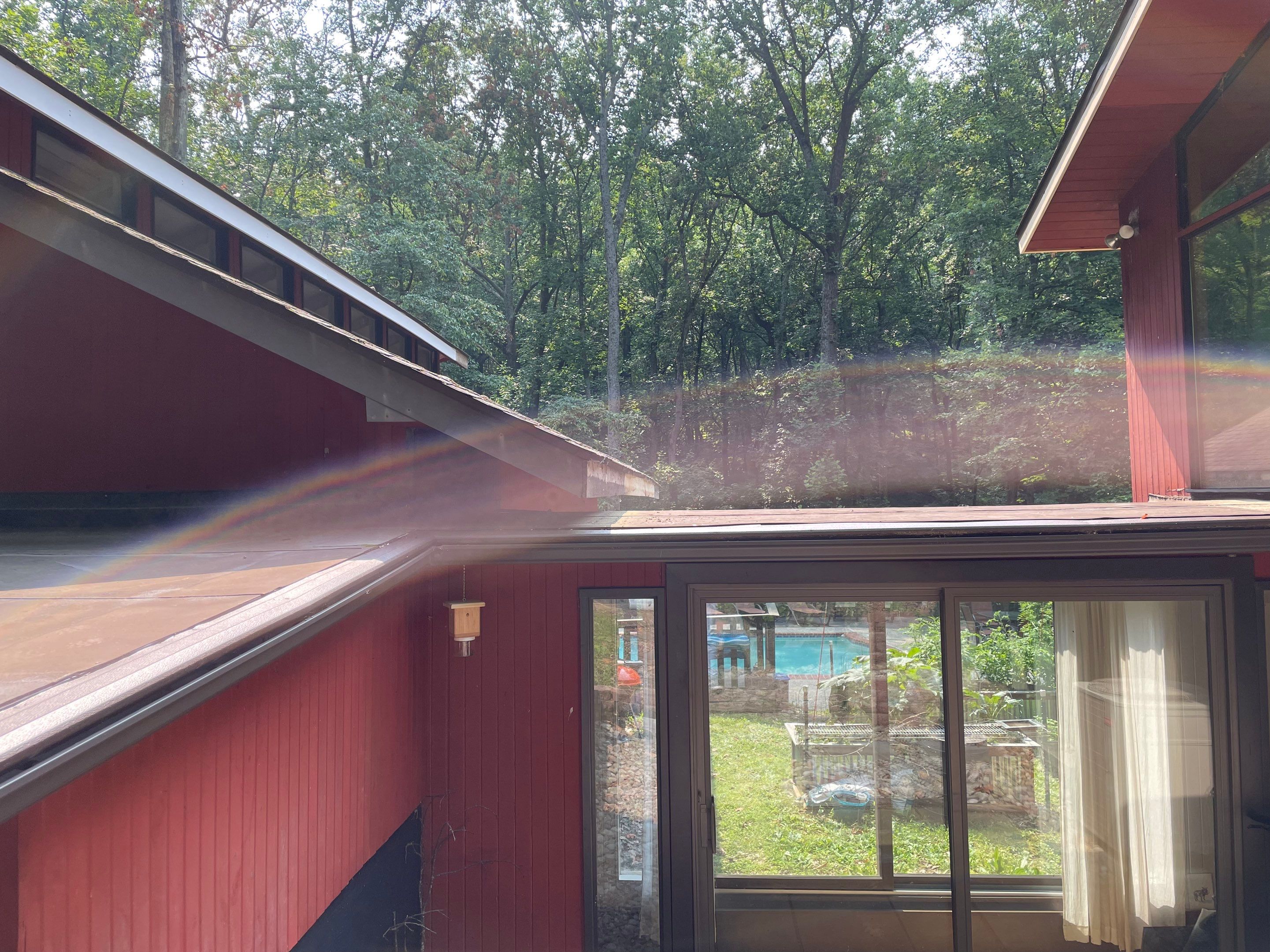 Deckhouse Roof Replacement by American Home Contractors