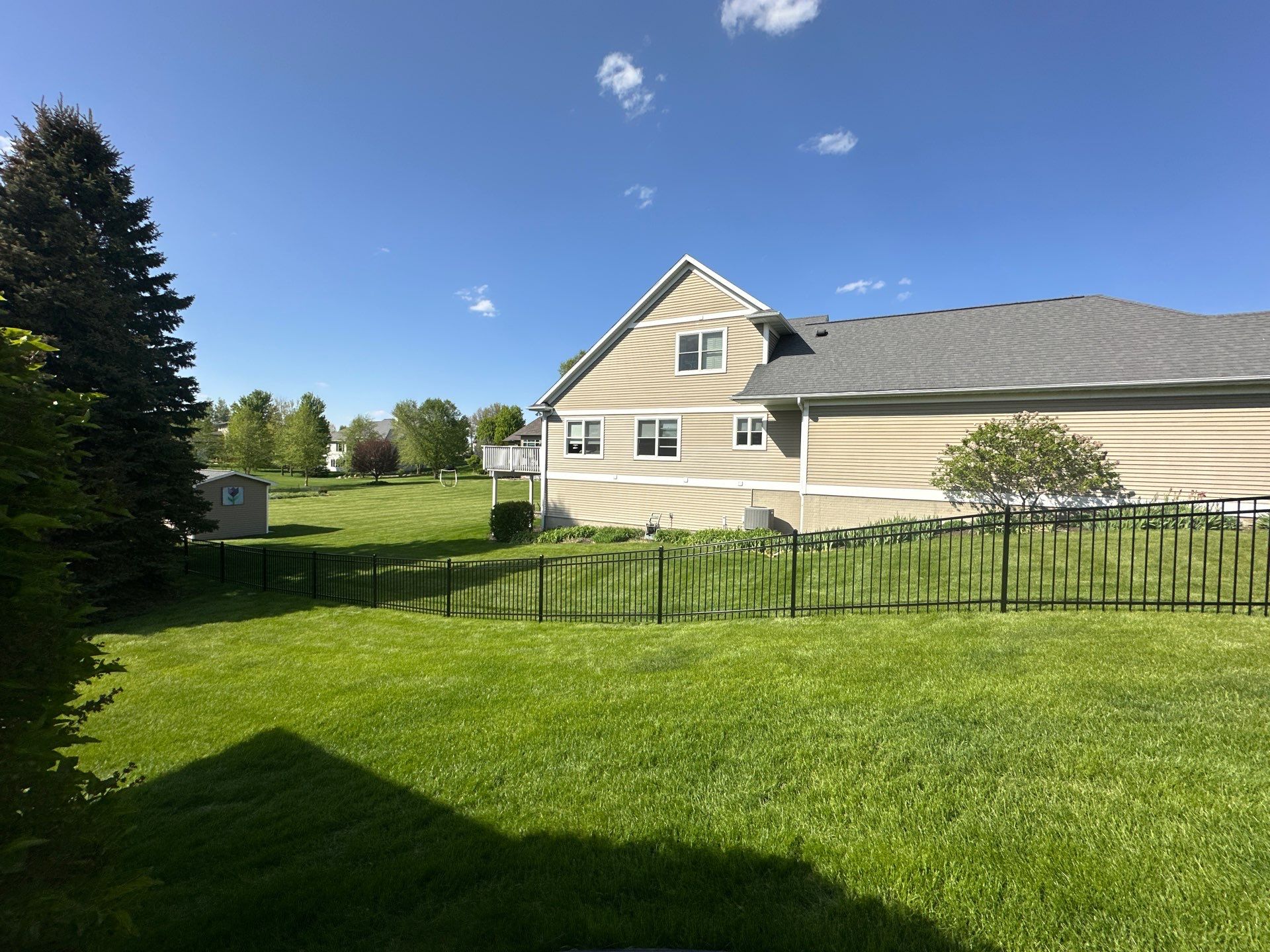 Black Ornamental Metal Picket Fence Installation in Waterloo by Perfect Picket Fence and Stain