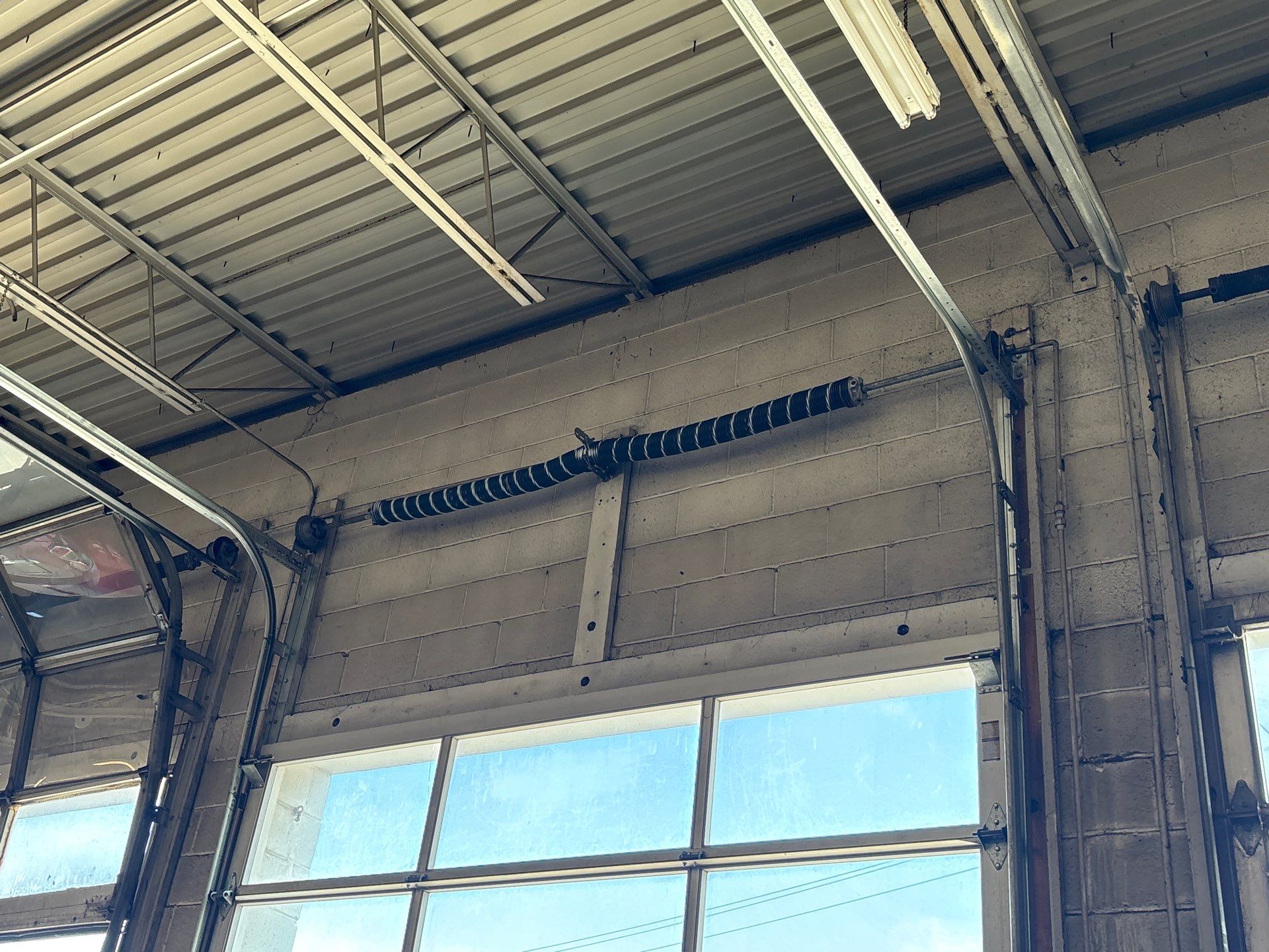 Commercial garage door repair for a local auto service shop in Warren, OH by Ohio Garage Door Repair