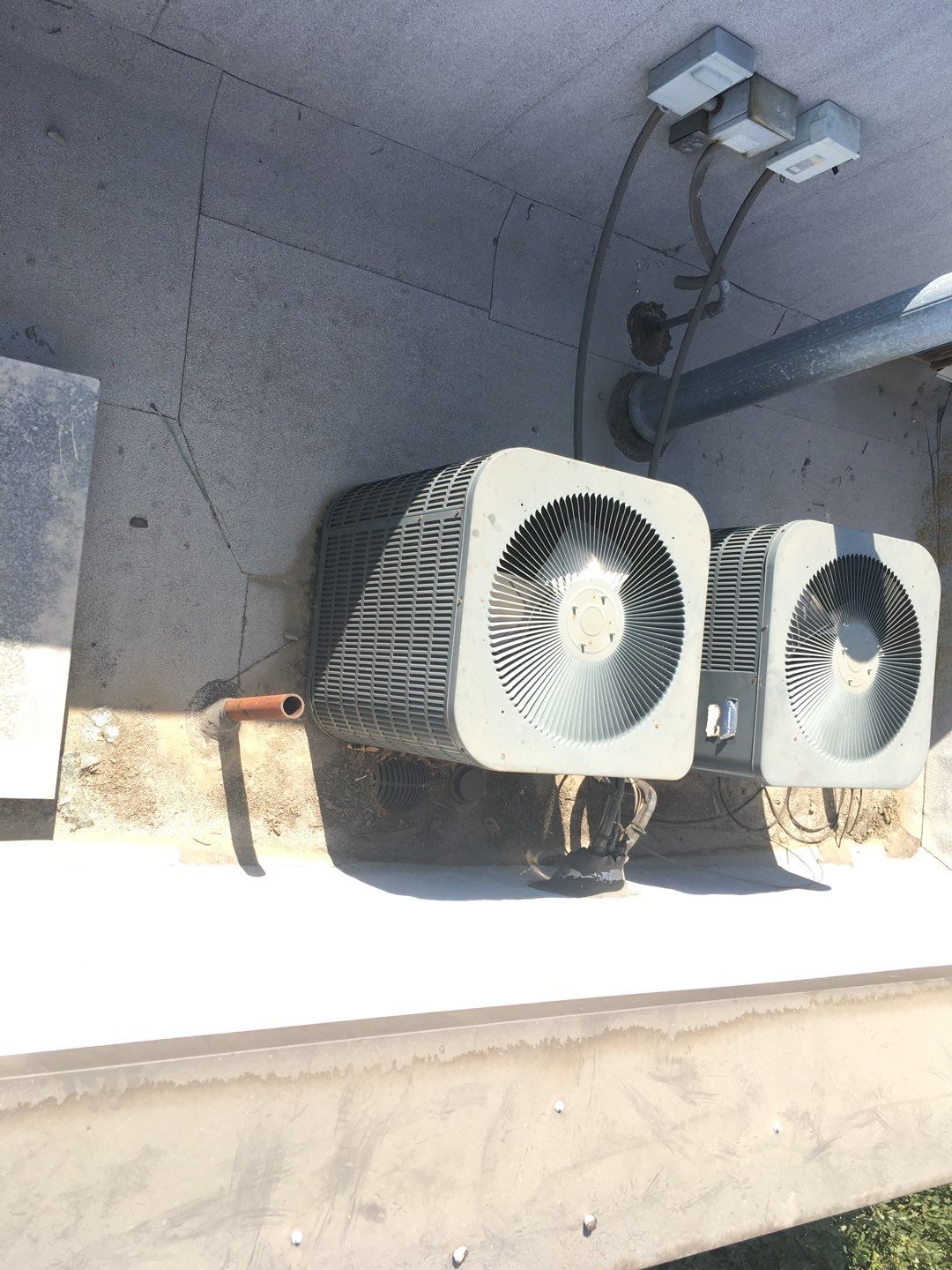 Spray foam and coatings inside commercial building HVAC well using Spray foam and coatings over existing BUR system by Straight Edge Roofing Inc