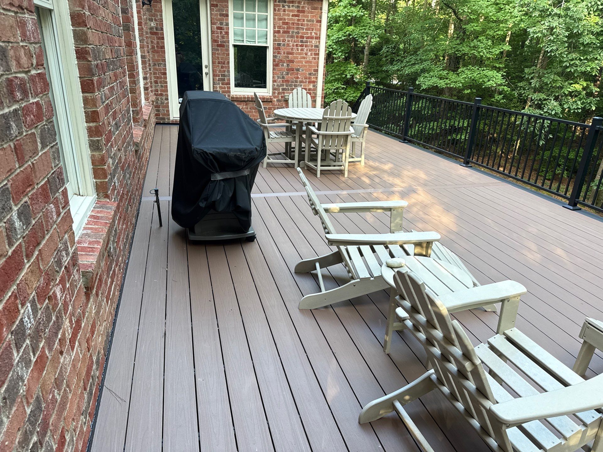 Deck Resurface using Deckorators Summit Series and Deckorators ALX Contemporary railing by Nelson Exteriors 