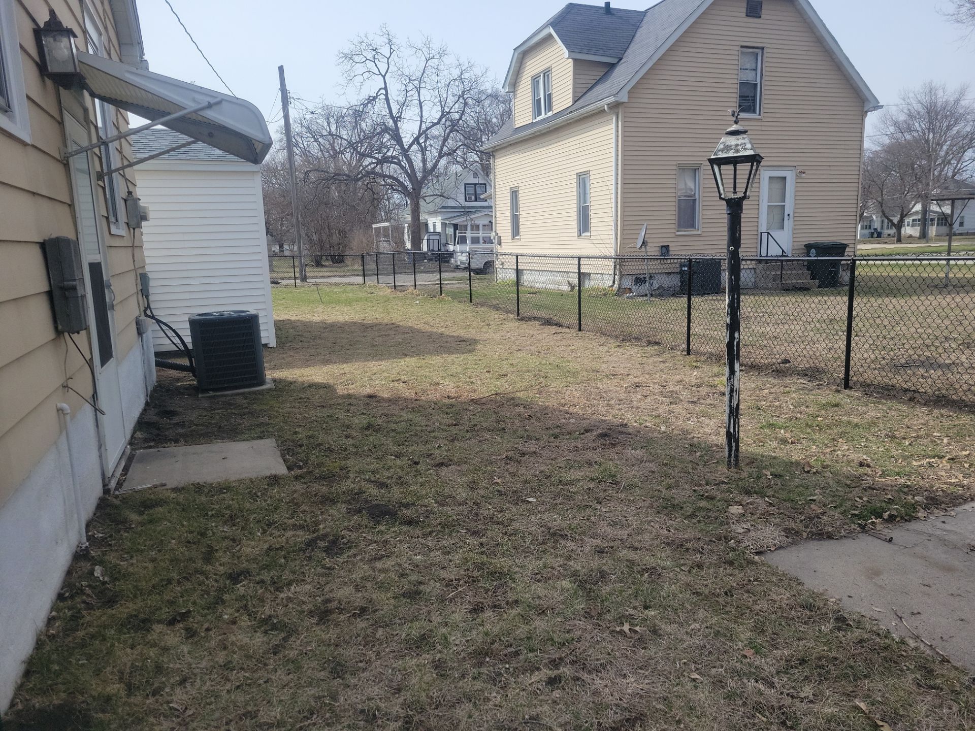 Black Chain Link Fence and Gate Installation in Waterloo by Perfect Picket Fence and Stain