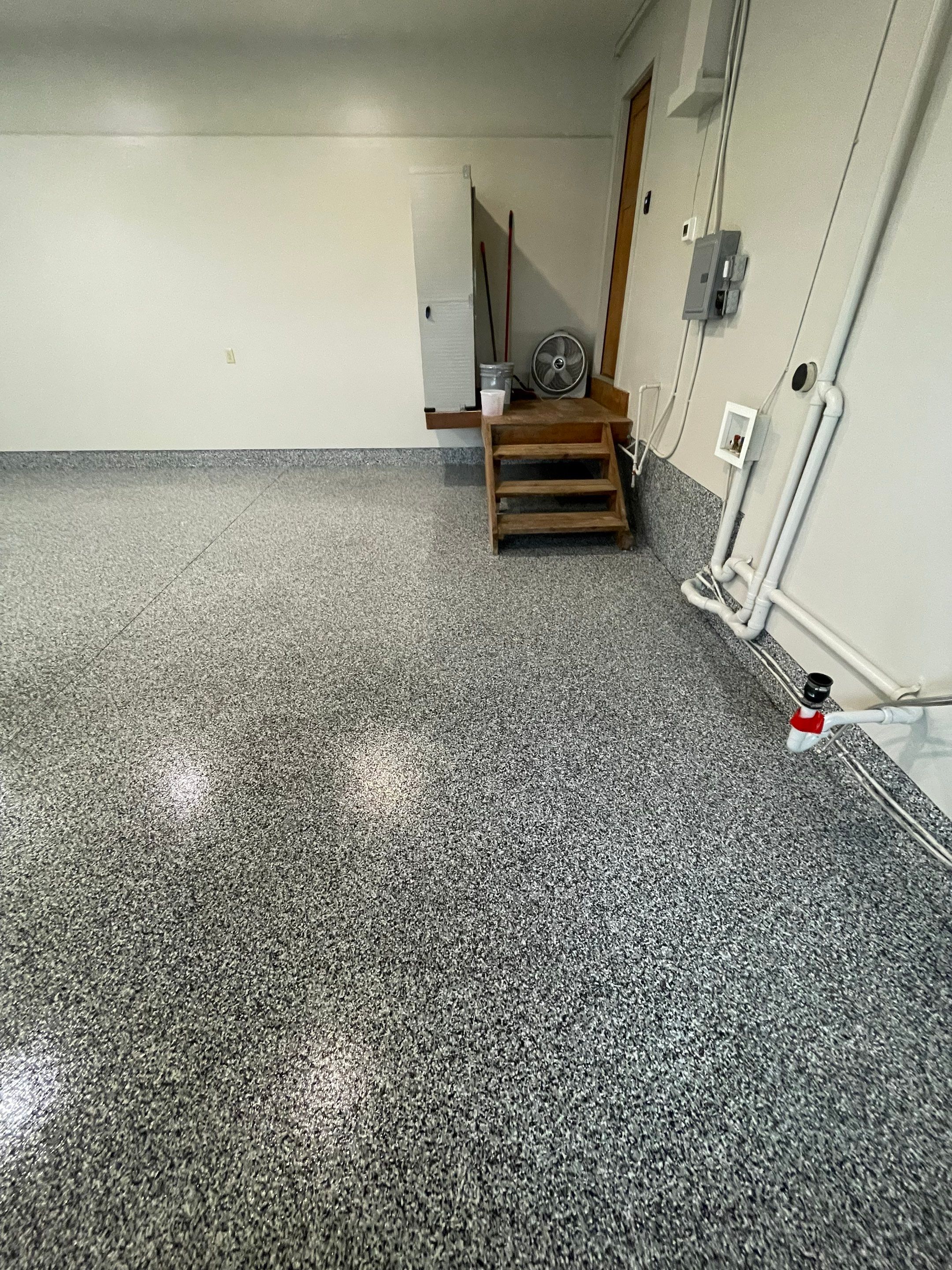 Domino Flake Floor Coating and Crack Repair in Chancellor by Select Painting, Coatings & Garage Cabinets