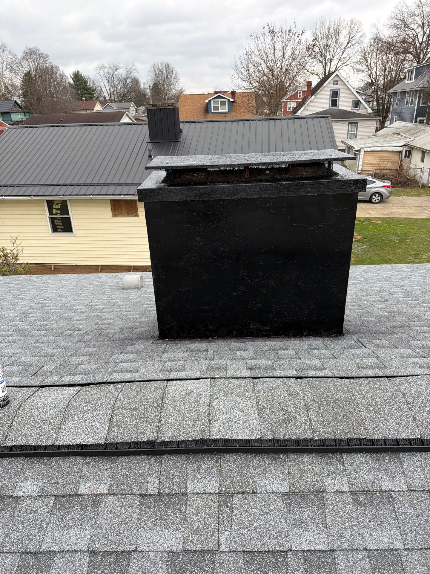 Residential Roofing Installation using EPDM and GAF Timberline HDZ Hickory by Rainstoppers Roofing
