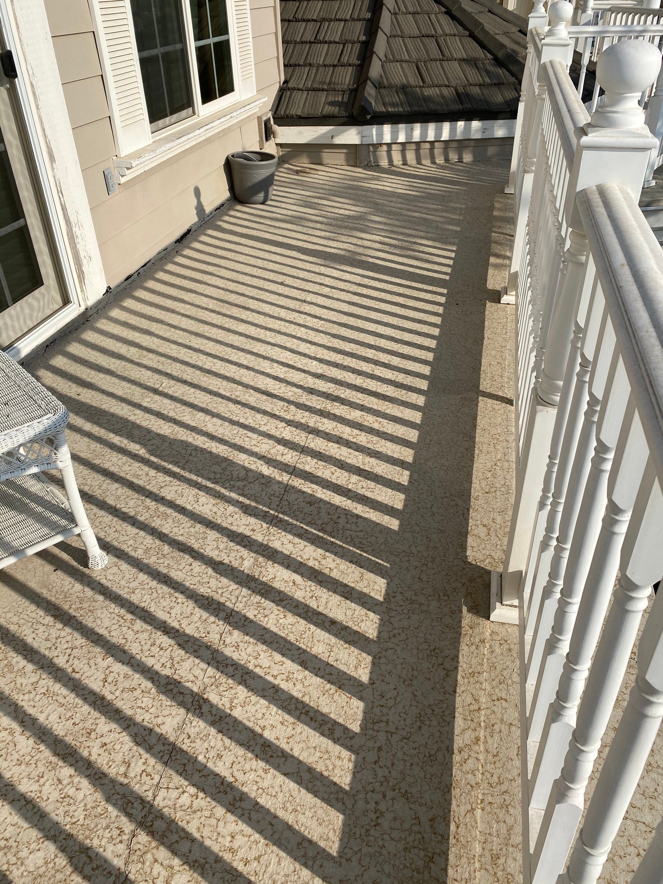 Sealant system over walk deck over house using Rubber coat and coatings by Straight Edge Roofing Inc