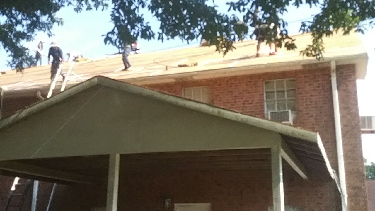 Residential Roofing Installation using Roof Replacement by American Roofing & Construction LLC