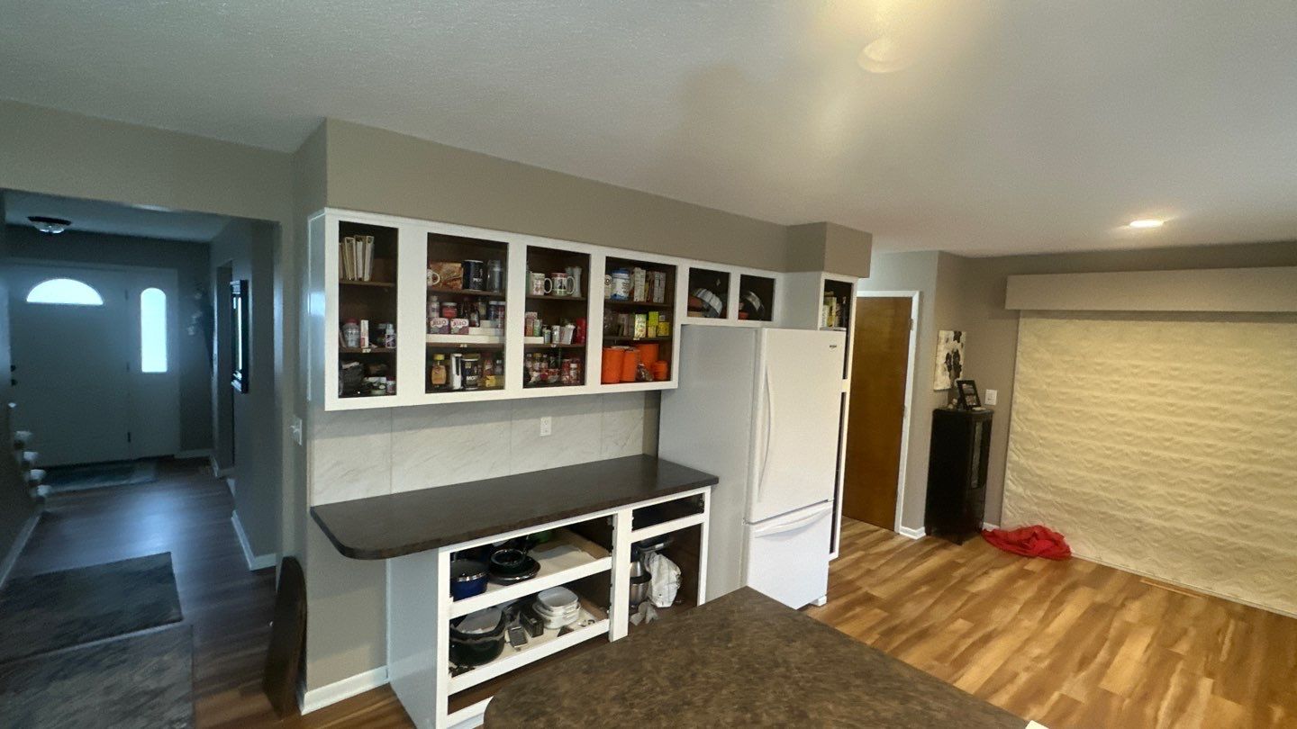 Kitchen Cabinet repaint by Cutting edge painting 