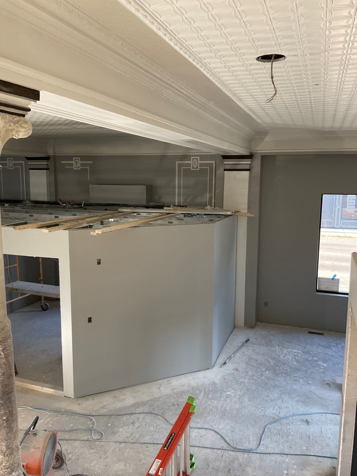 Commercial Interior Remodel for Dacotah Bank Featuring Decorative Tin Ceilings by Select Painting, Coatings & Garage Cabinets