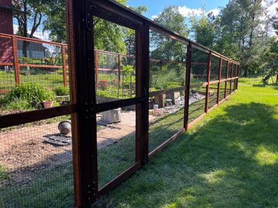 Stained Cedar Mahogany Garden Fence and Raised Bed Enclosure in Cedar Falls