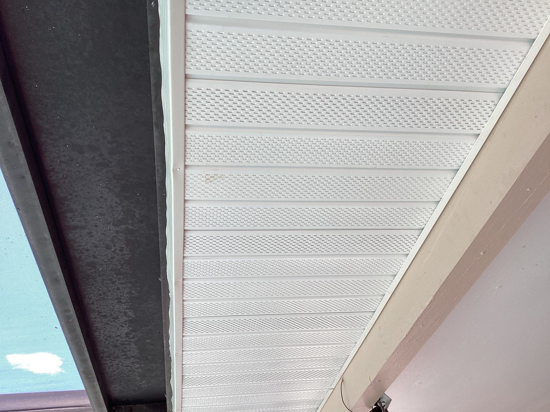 White Seamless Gutters and Splash Guards in Fort Myers FL by Gutter Professor by Gutter Professors