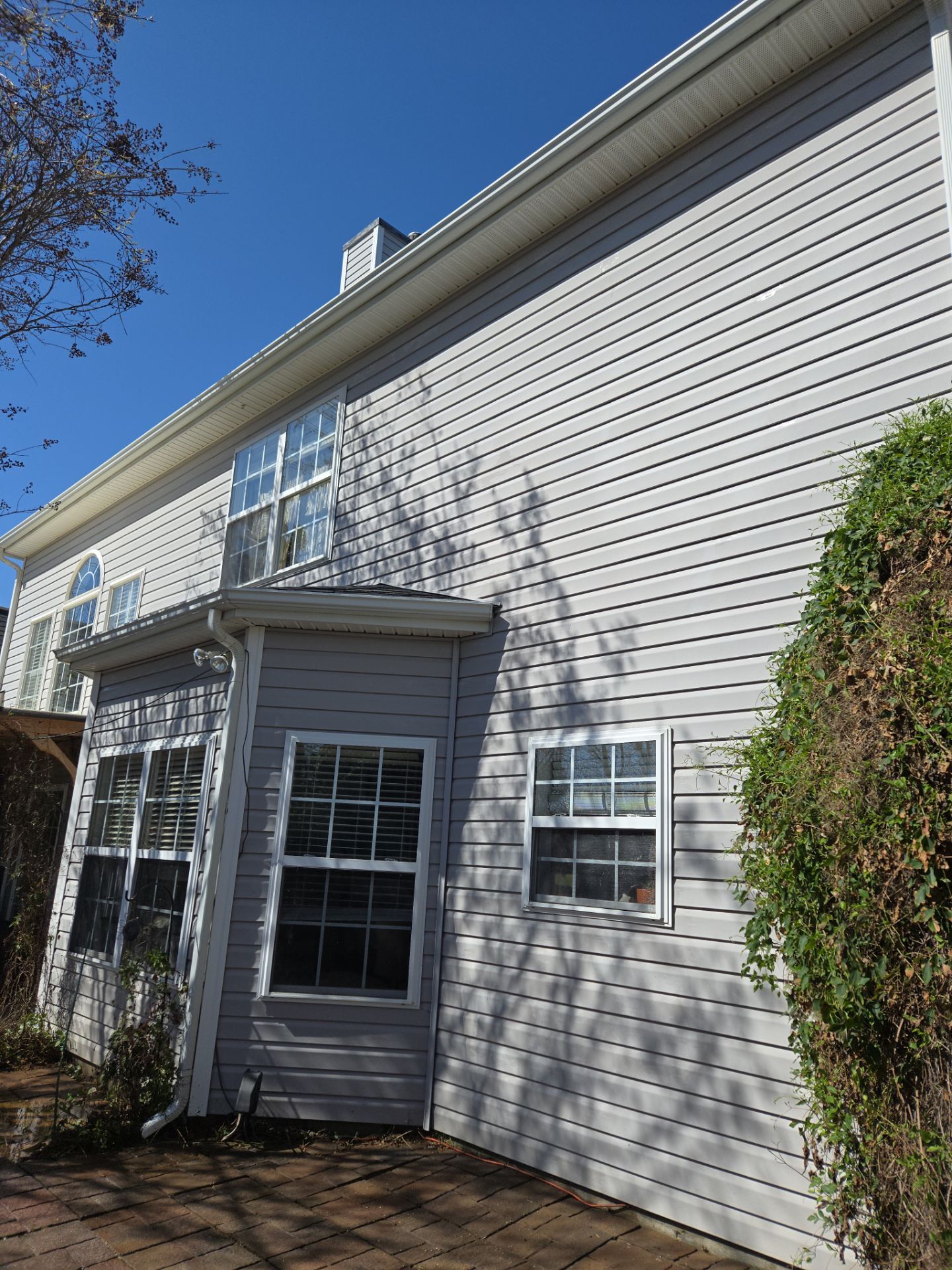 House Wash using cleaner by Power Wash Masters LLC