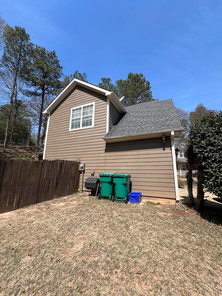 Green Exterior Paint and James Hardie Siding Transformation in Smyrna, GA by Nelson Exteriors 