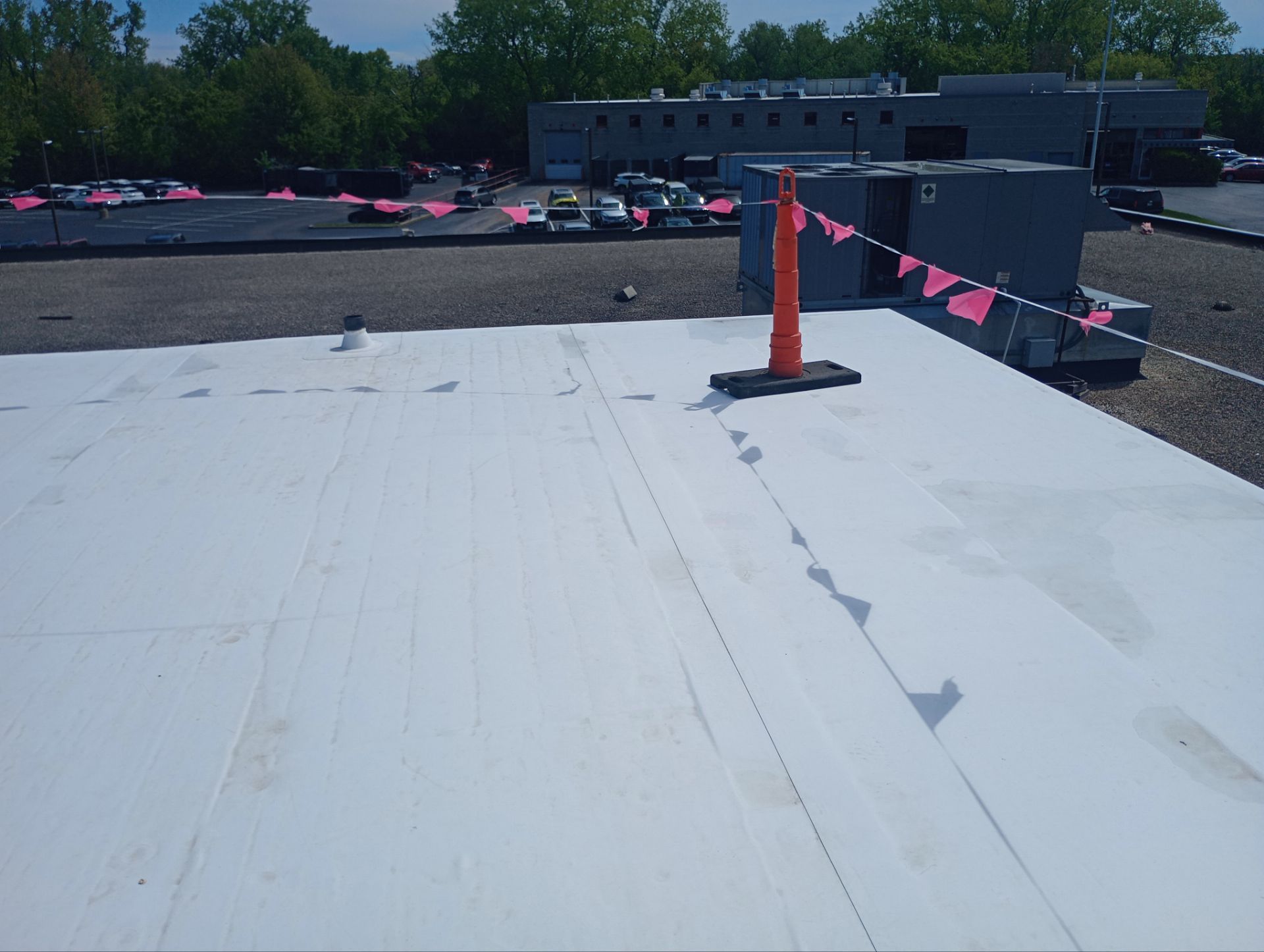 Ford Dealership - Re-Roof by Pink Roofing