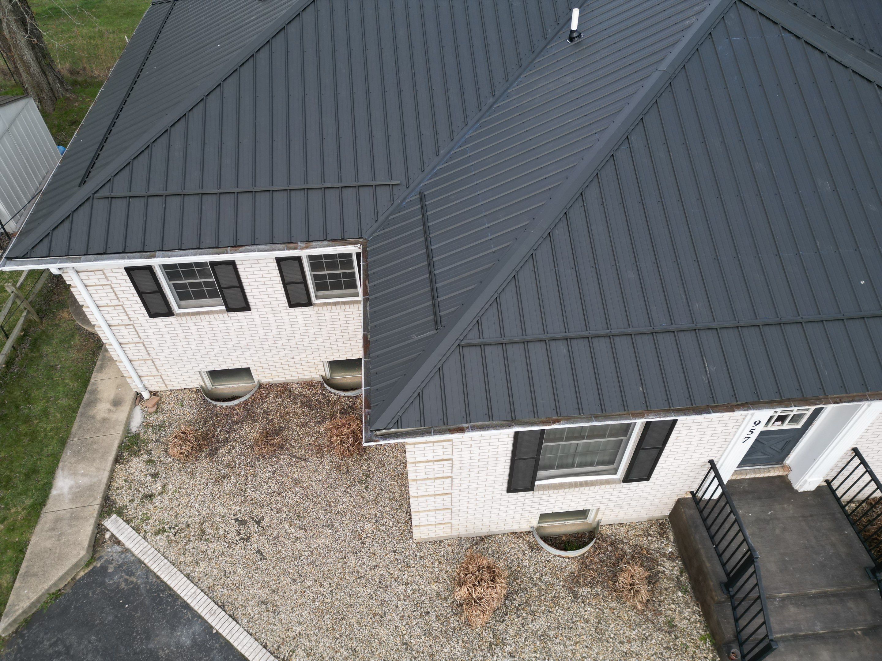 Commercial Roofing Installation using Performance Panel Metal - Frost Black by RoofX 