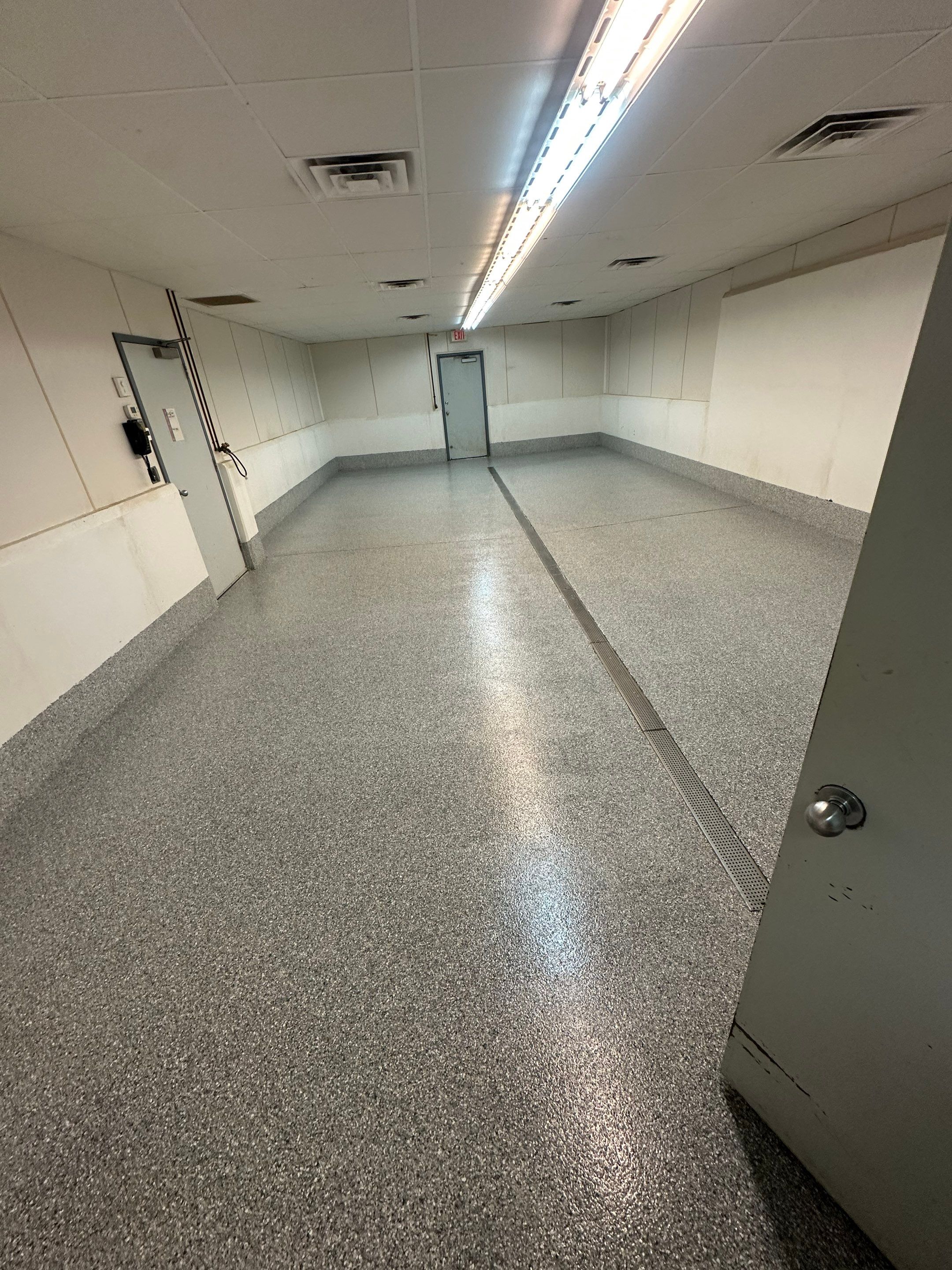 Durable Commercial Concrete Coatings for Brandon Valley Veterinary Clinic by Select Painting, Coatings & Garage Cabinets