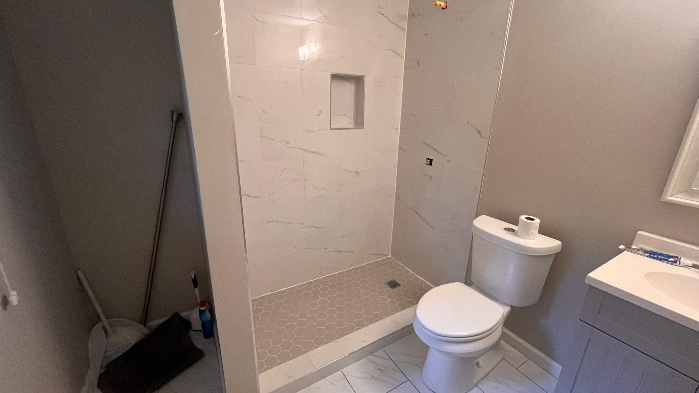 Tub to walk-in shower conversion by Prudencio