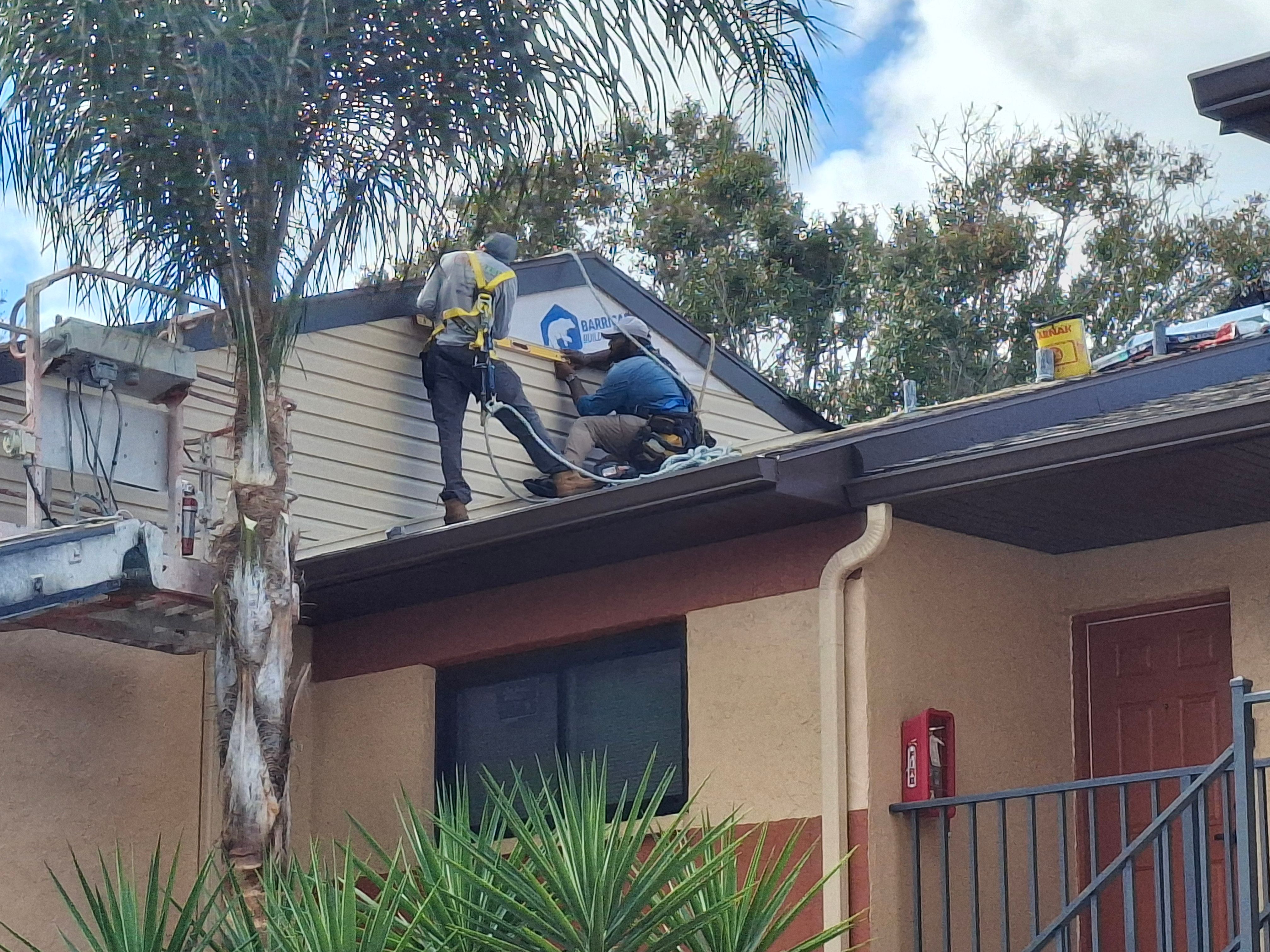 Multi-Family Roof Replacement and Siding Installation in Melbourne by Florida Roofing and Renovations Inc.