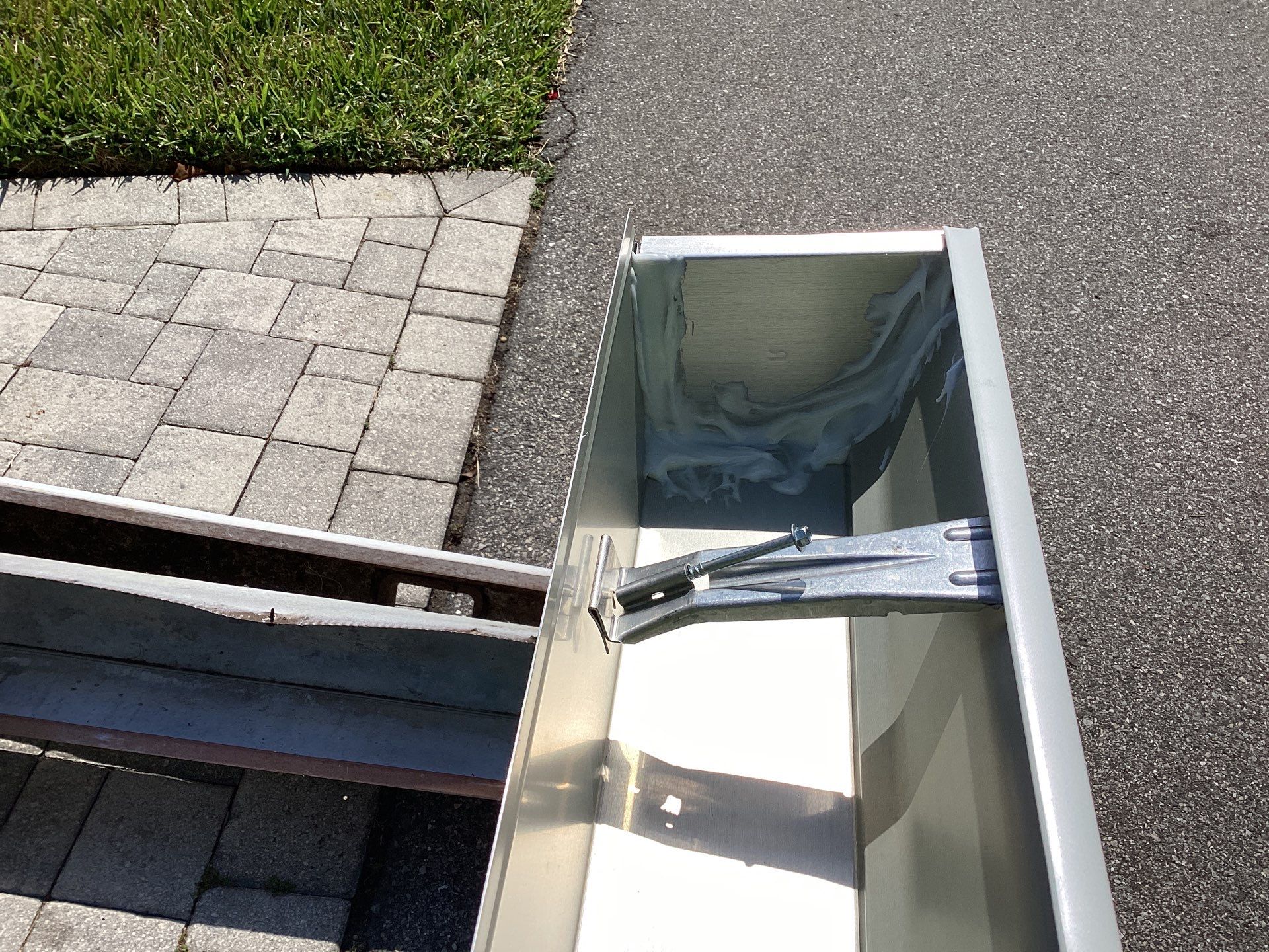 White Gutter Installation in Sarasota FL by Gutter Professors