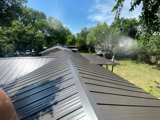 Dark Bronze - L&A Standing Seam with Striations by RoofsOnly.com