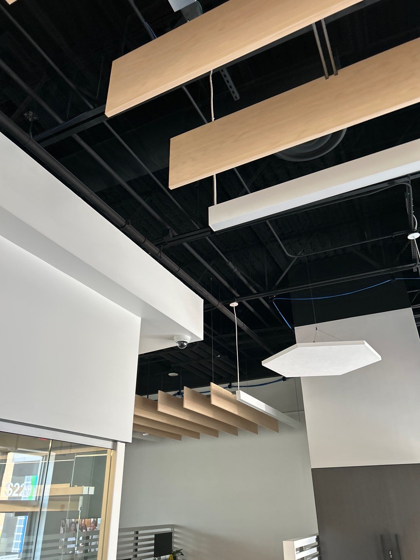 Office Remodel Featuring Acoustic Baffles and Professional Carpet Installation by CompanyCam Sales Demo