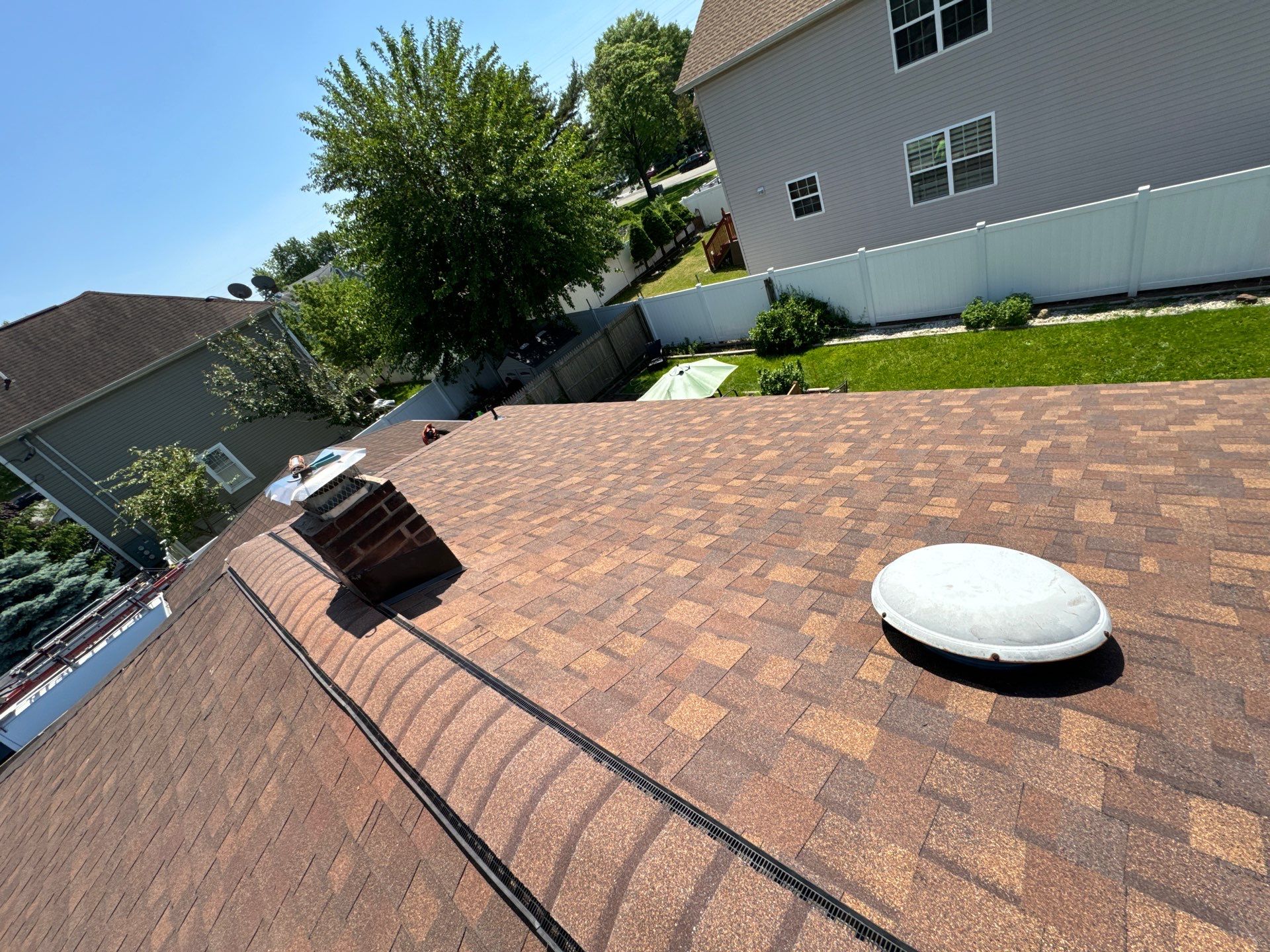 Brownwood Shingles by Reimagine Roofing