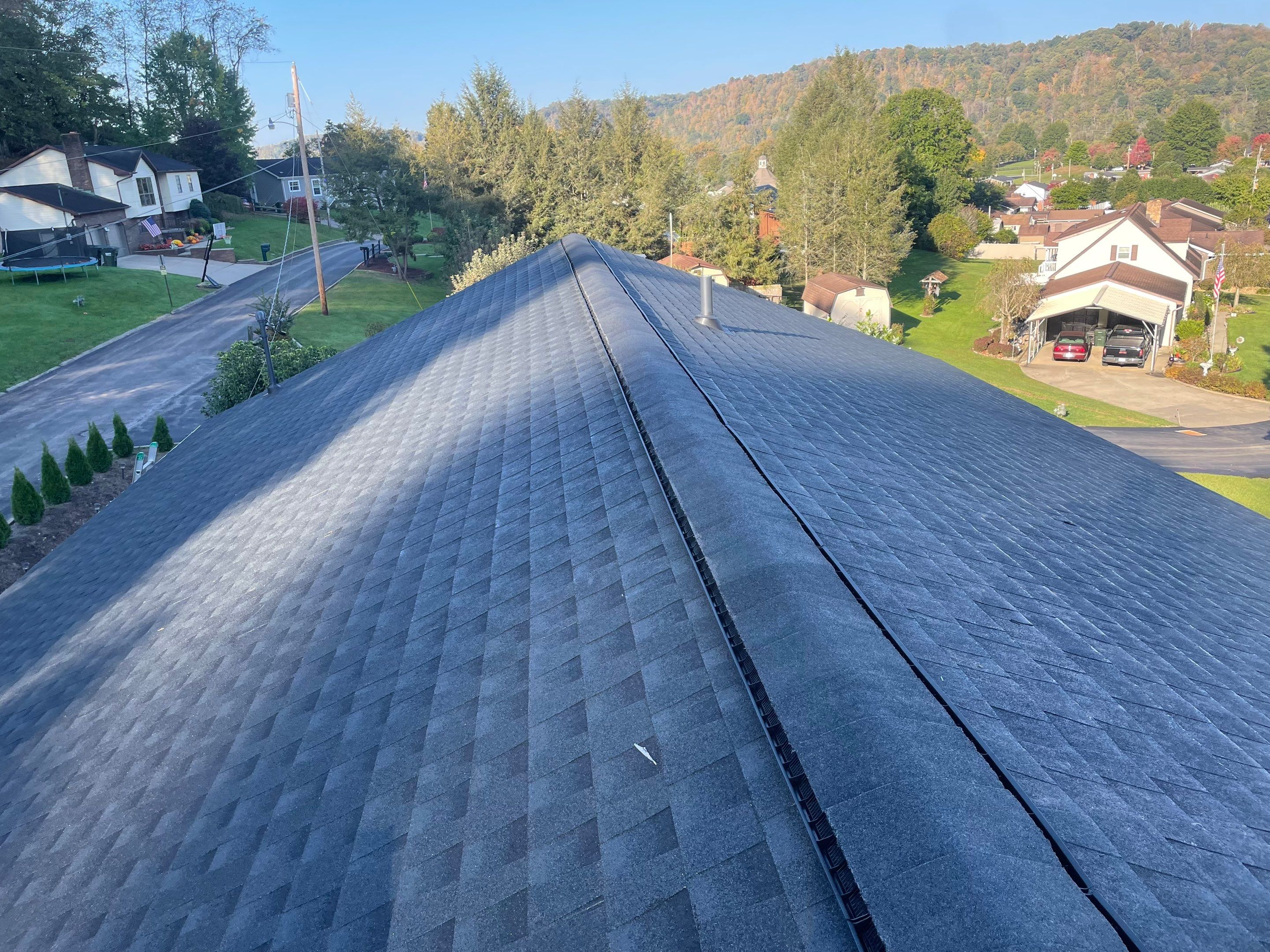 Residential Roofing Installation using GAF Timberline HDZ, Black by Rainstoppers Roofing
