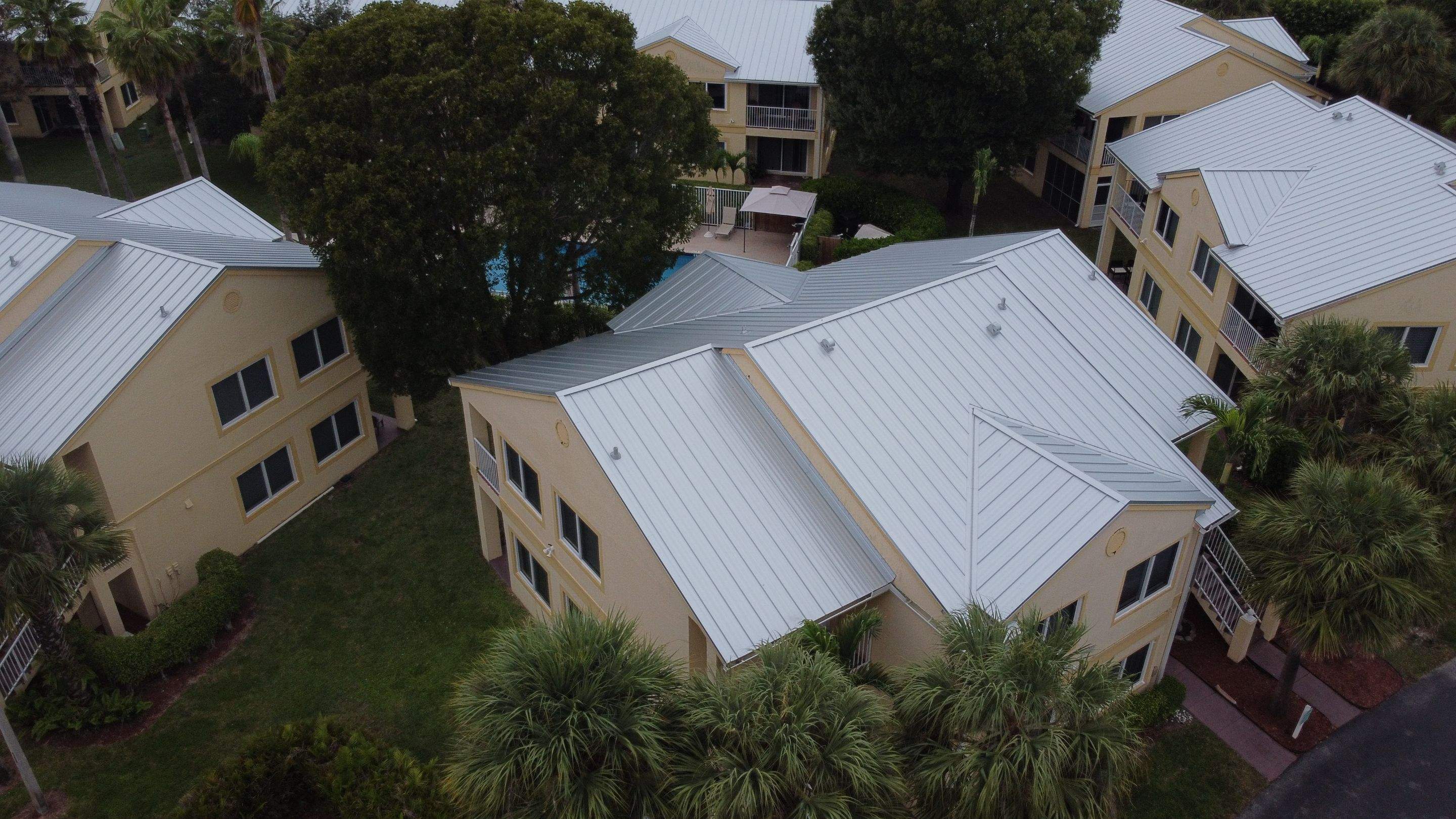 Commercial Roofing Installation using 1" Nail strip metal roof by BLUES BROTHERS ROOFING