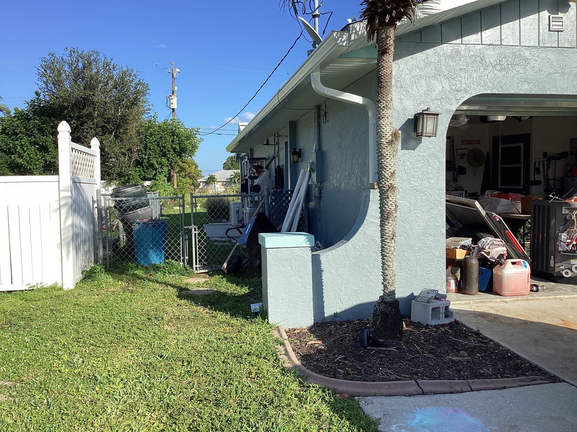 Soffit and Fascia Installation using White Vinyl Soffit in Cape Coral FL by Gutter Professors