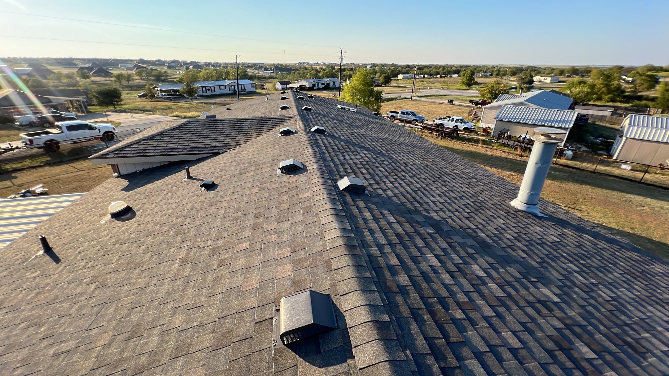 Residential Roofing Installation using ATLAS Pinnacle Pristine Shingles by Harvey Roofing & Construction