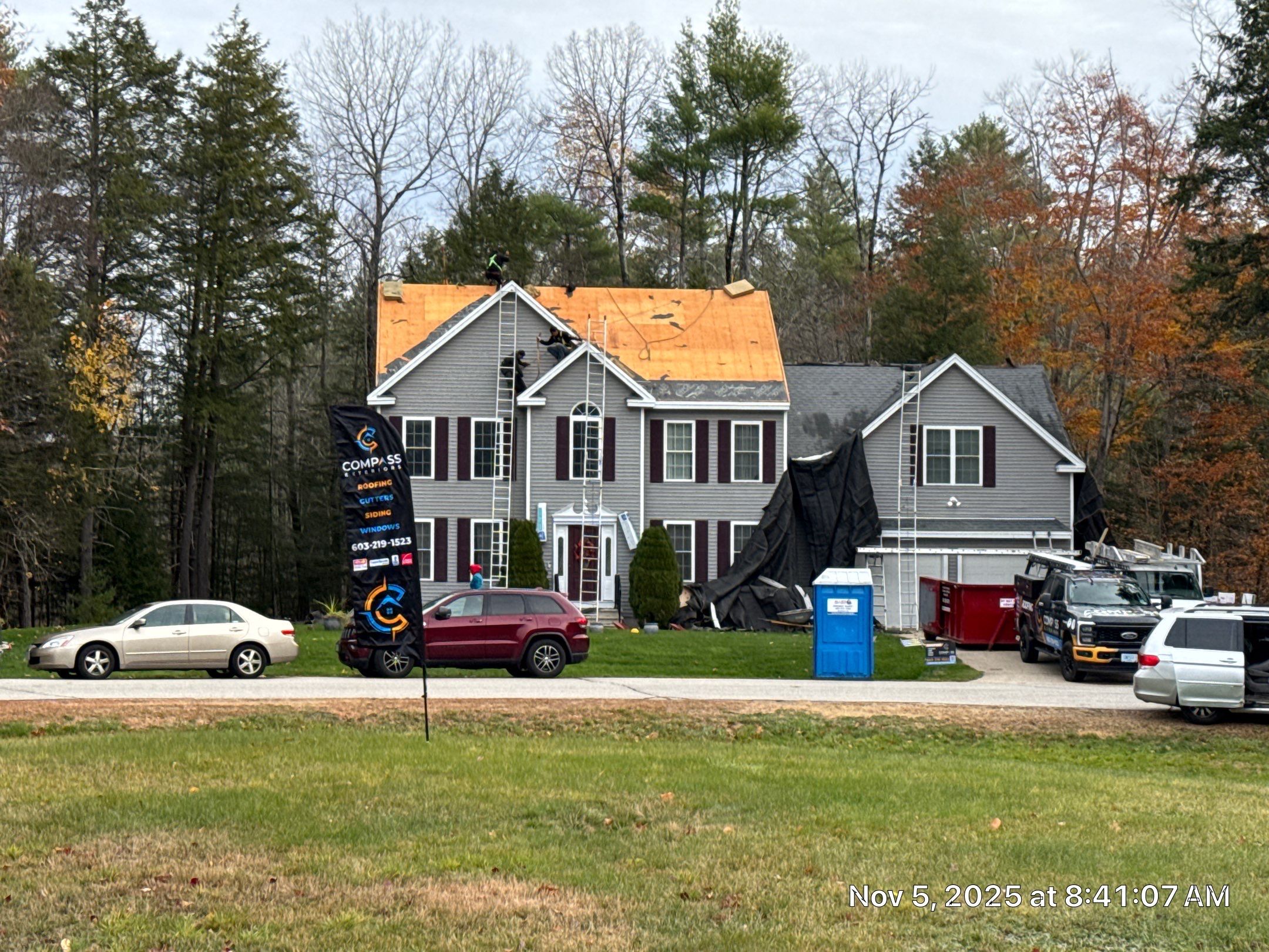 Brentwood, NH Roof Replacement with Velux Skylights and Onyx Black Owens Corning Shingles by Compass exteriors