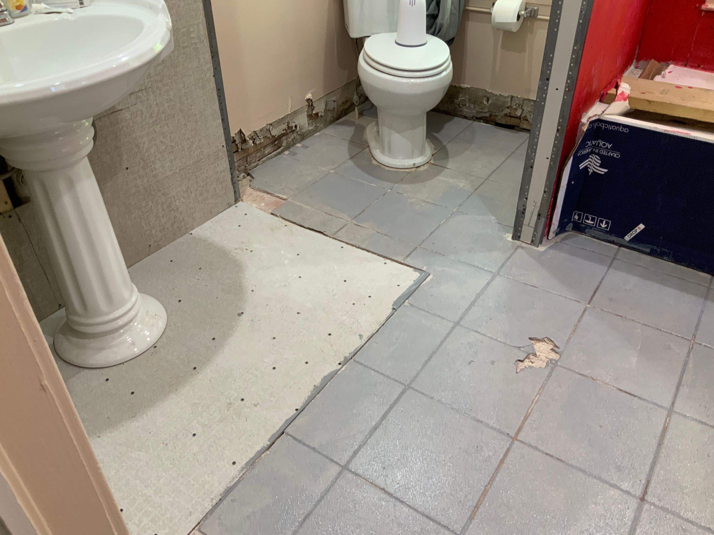 Bathroom Remodel using New Bathroom Tile and Tube by Alpha Design Services