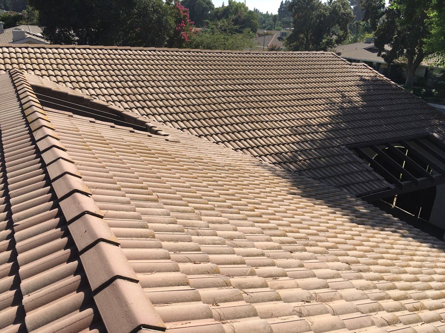 Tile roof remodel/ install OSB sheathing under tile and replace using OSB board with new underlayment, tile, and battens by Straight Edge Roofing Inc