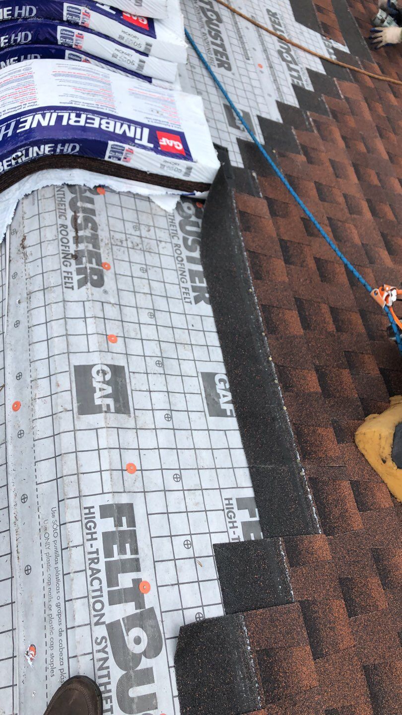 Residential Roofing Installation using Roof Replacement by American Roofing & Construction LLC