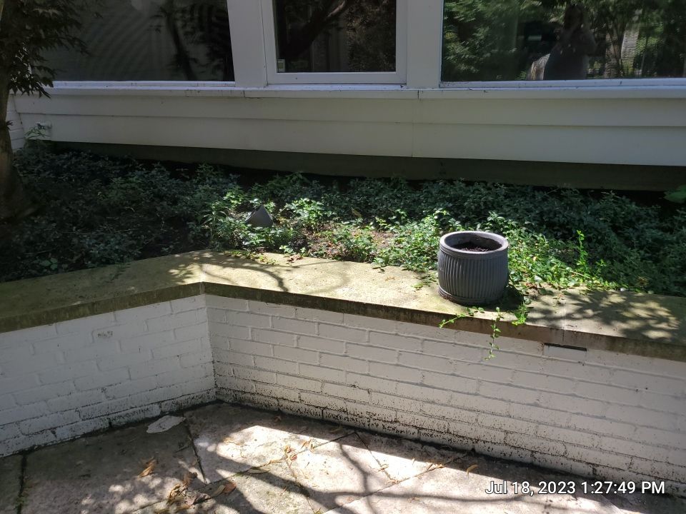 marble patio cleaning and sanding using Polysweep polymeric sand by Northern Power Washing LLC.